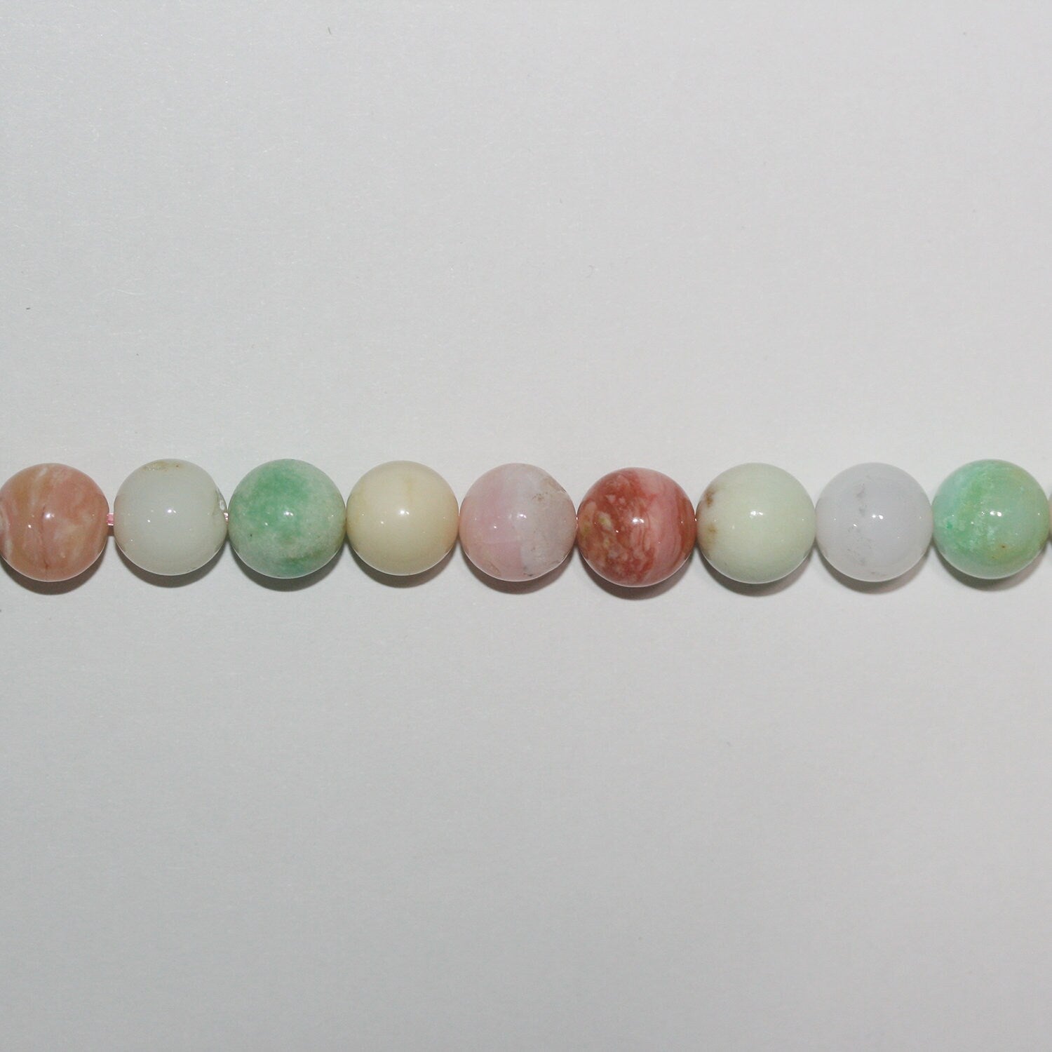 15" Sainte Chrysoprase - Perles rondes lisses en opale rose 10 mm - Fil de 39 cm.