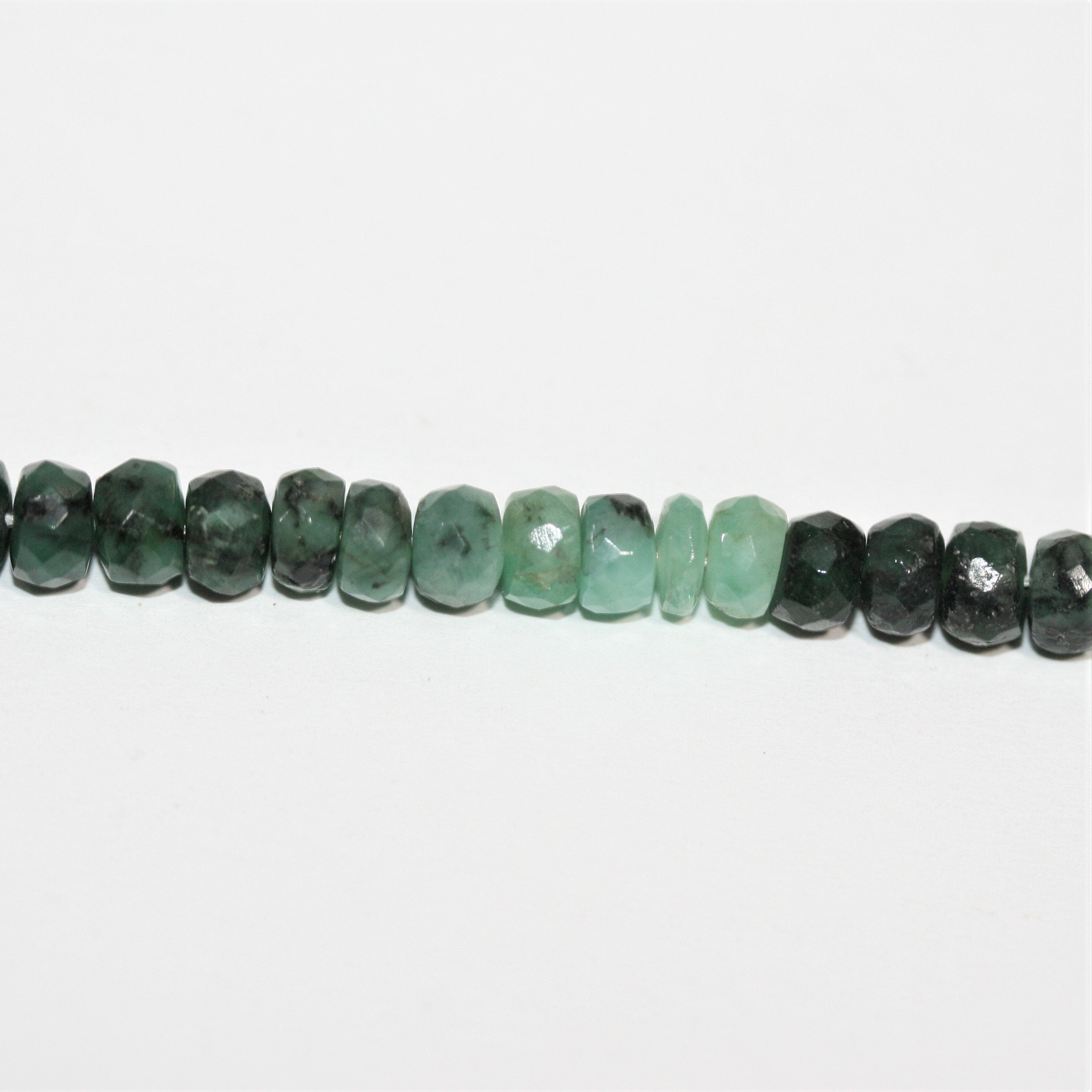 13" St Emerald Faceted Rondelle Beads 6x4mm.- Strand 33cm.