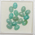 Lot de 15 cabochons ovales lisses en amazonite de 7 x 5 mm.