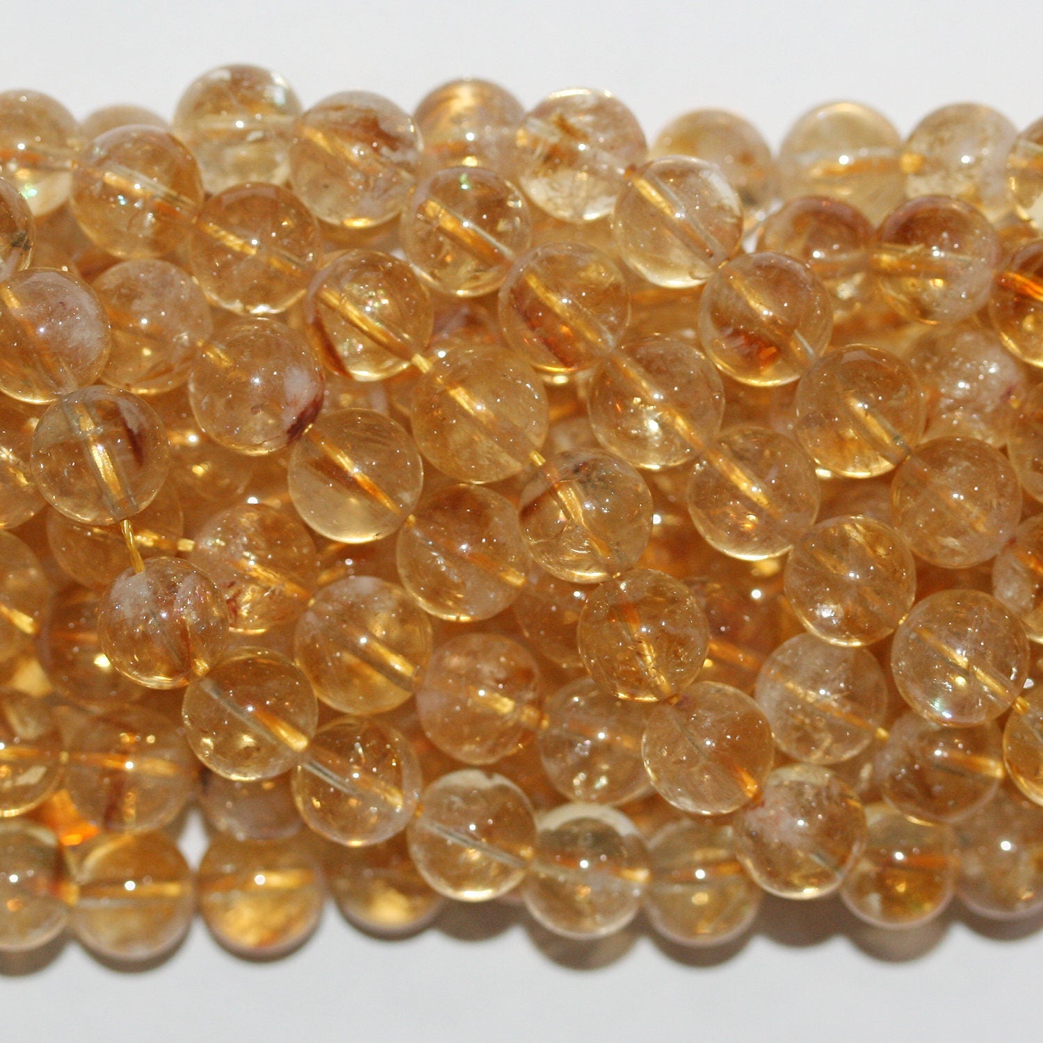 15" Perles rondes lisses en citrine St 8-9mm- Brin 39cm.
