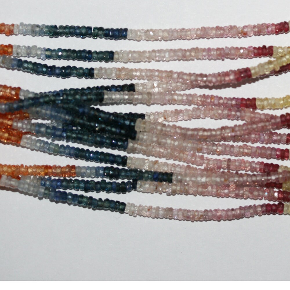 Cuentas redondas facetadas de zafiro múltiple de 16" de St. de 2,5 x 1,5 mm.