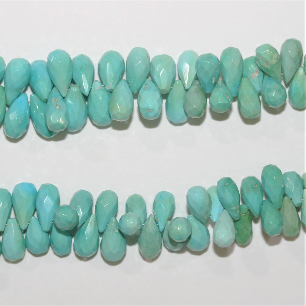 Perles en turquoise St à facettes en forme de goutte, 8 pouces, 10 x 5 mm. Longueur du fil : environ 20 cm.