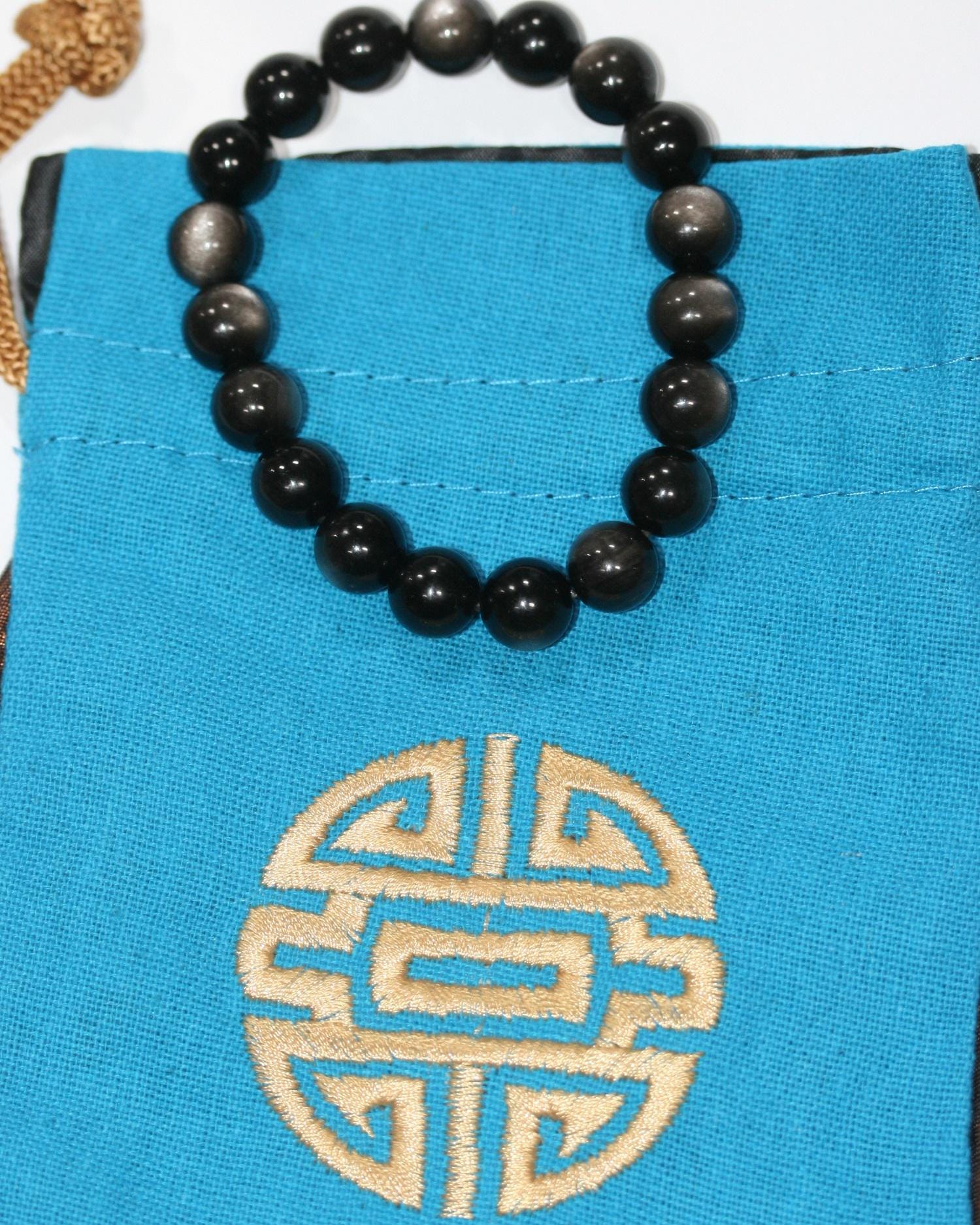 Pulsera de Obsidiana Plateada Bola Lisa 10mm Ref.14861 - Poder Curativo