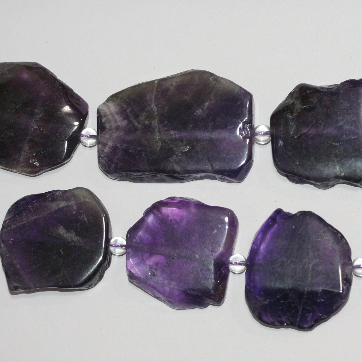 Cuentas irregulares planas y lisas de amatista de 16" (30-35 mm, aprox.), tira de 40 cm