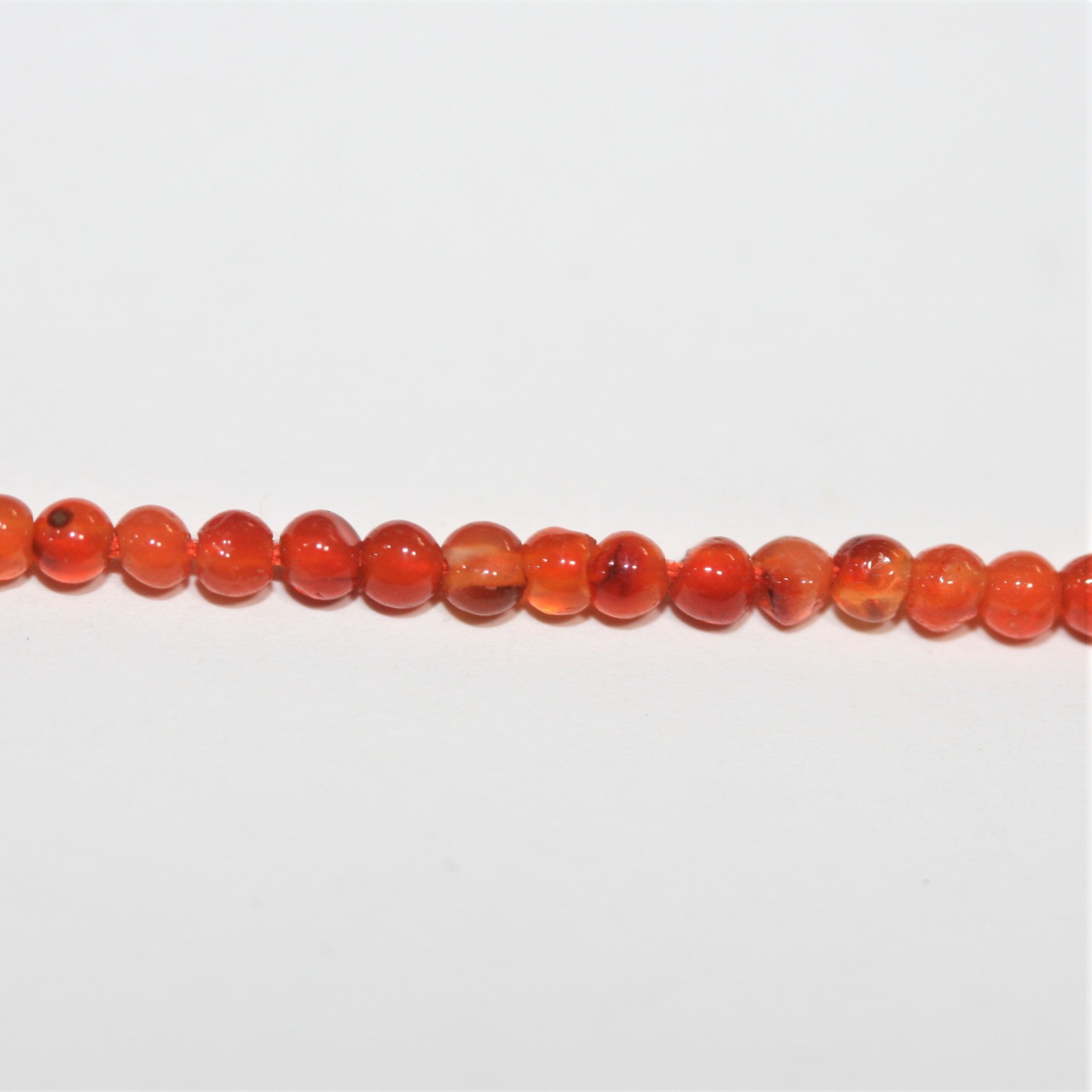 13" St Carnelian Smooth Round Beads 2mm.- Strand 33cm.