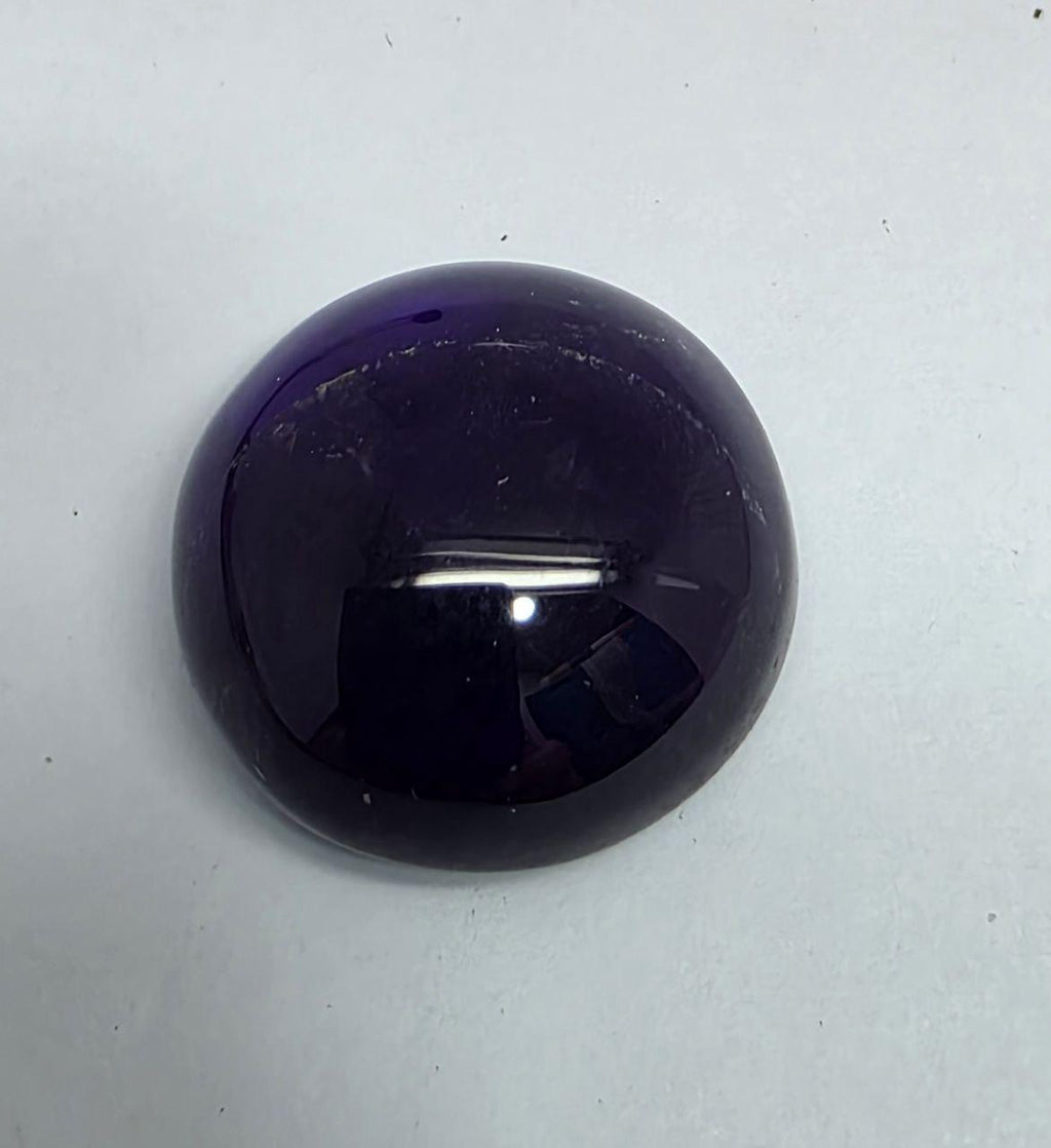 Cabochon rond d'améthyste 18 mm (19,4 ct).