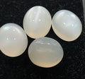 Lote de 4 cabujones ovalados de piedra lunar blanca de 12 x 10 mm. (4 piezas)