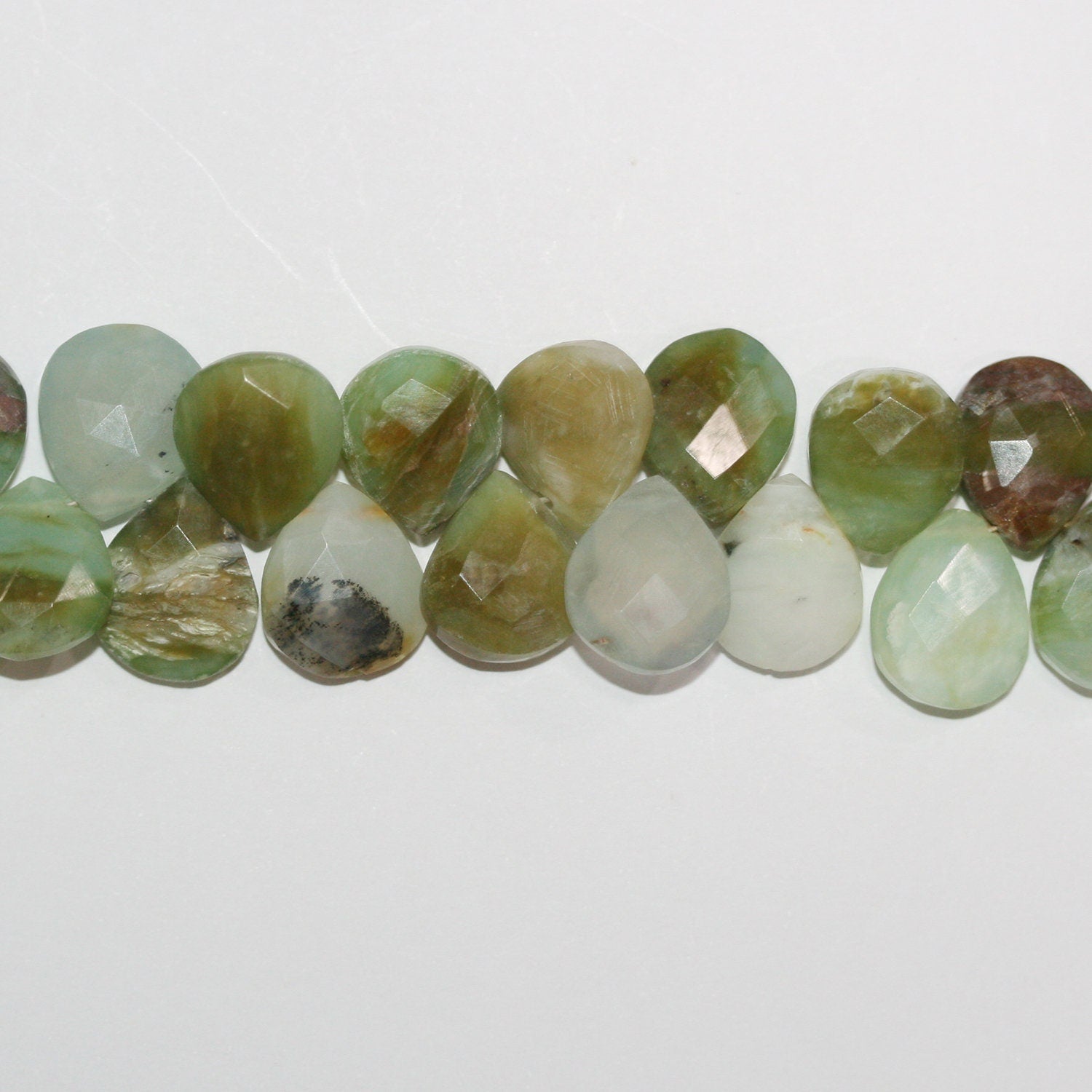 Perles ovales à facettes péruviennes de 8 pouces, 13 x 10 mm - Fil de 20 cm.