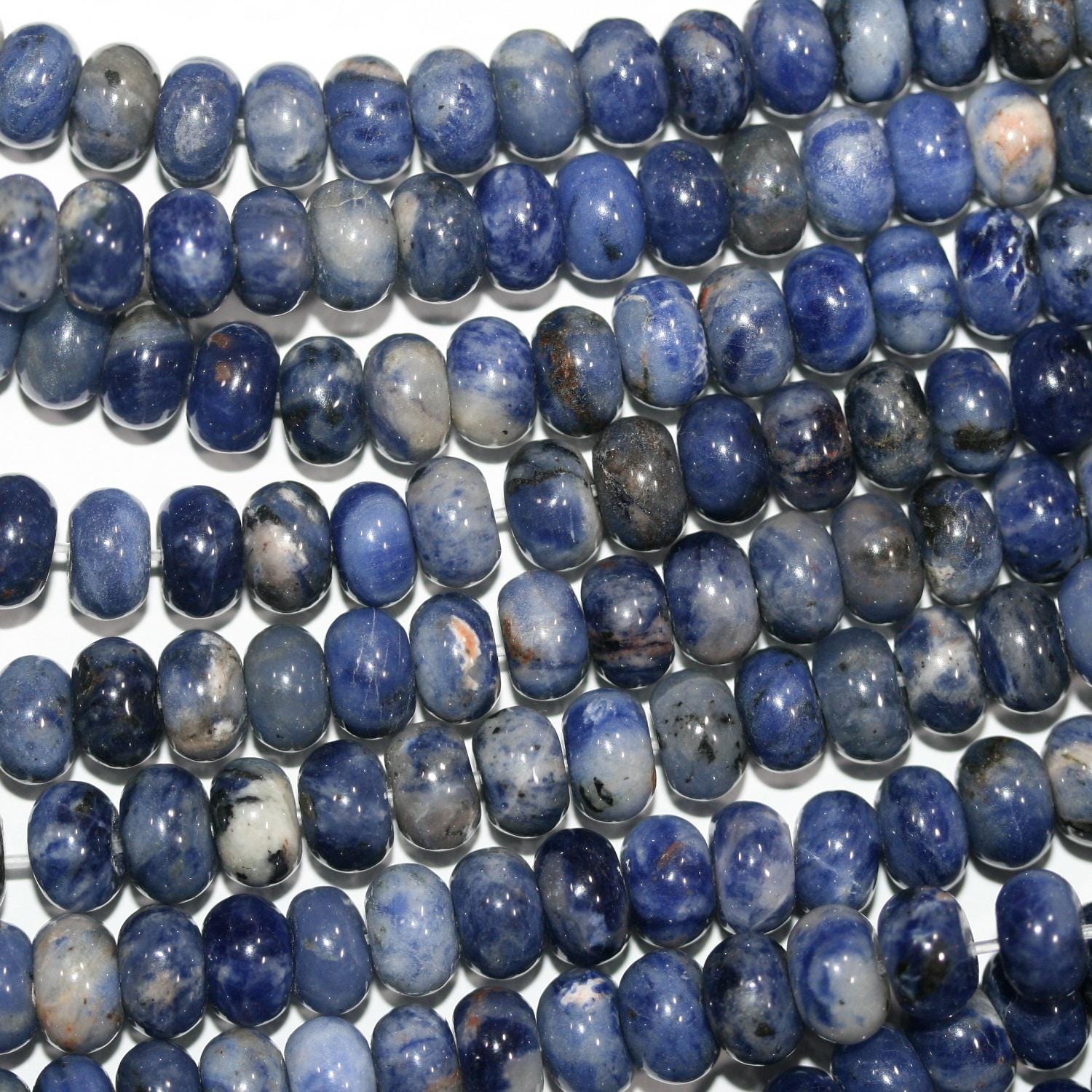 Perles rondelles lisses en sodalite St de 15 pouces (8 x 5 mm). Longueur approximative du fil : 39 cm.