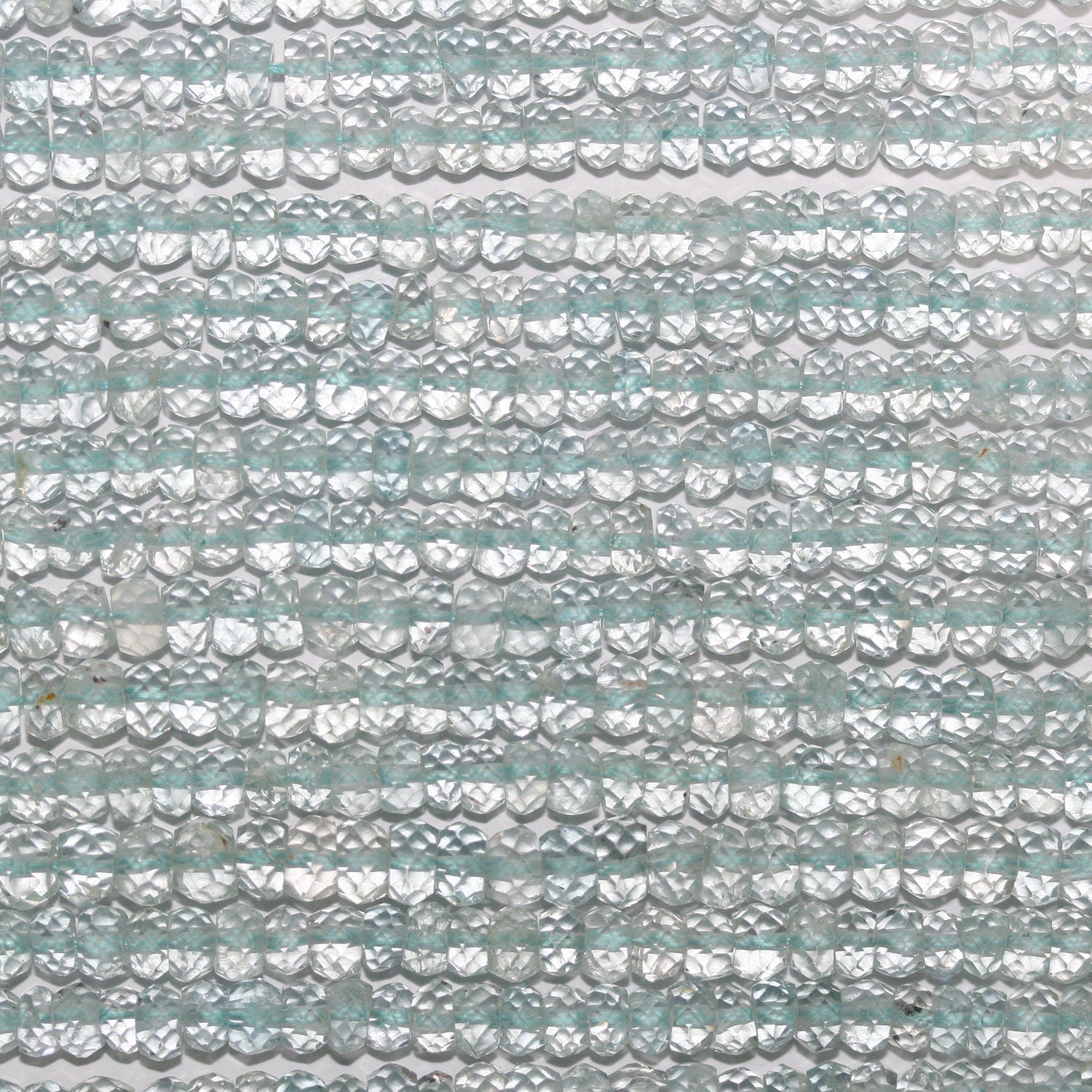 13" St Aquamarine Faceted Rondelle Beads 4x3mm.-Strand 33cm.