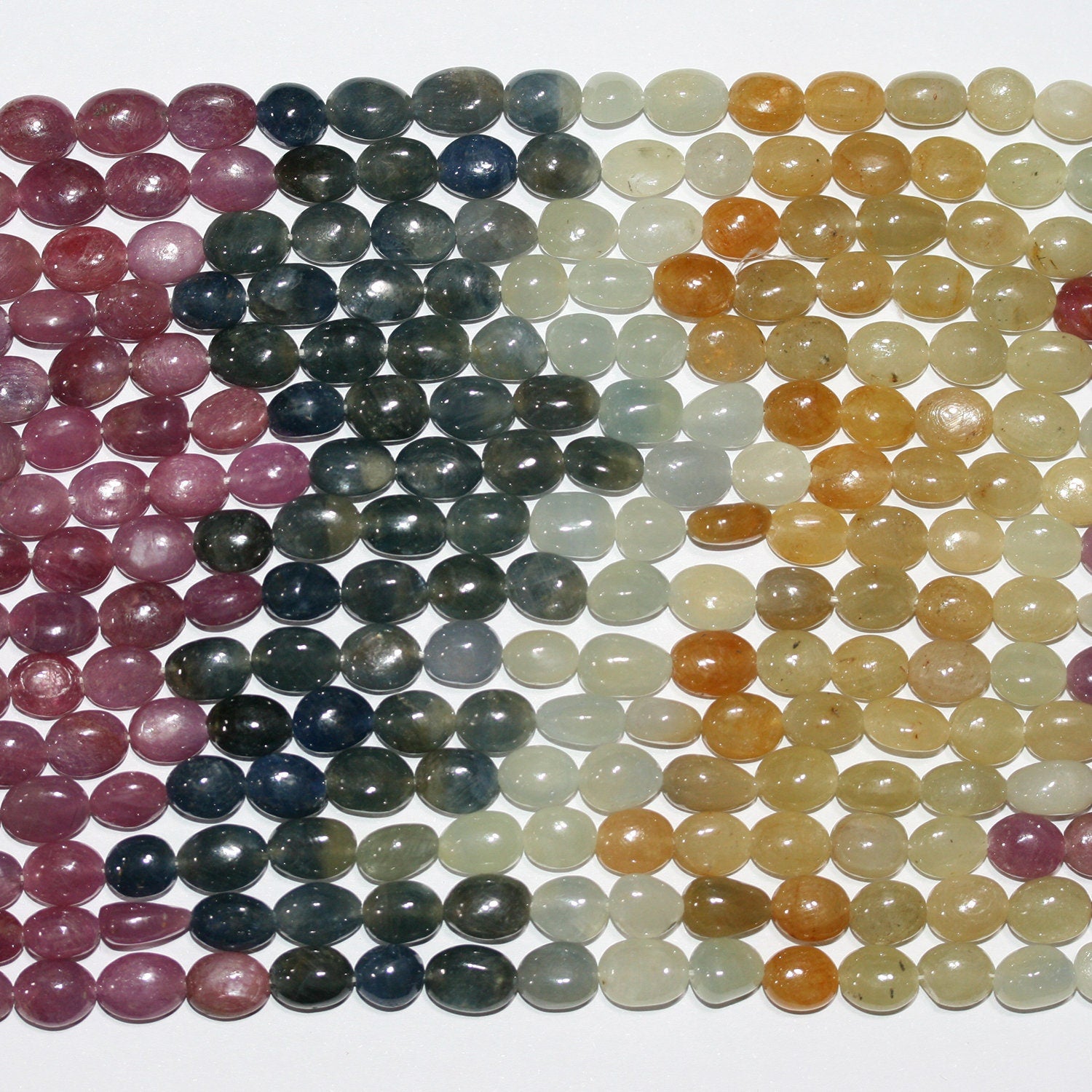 14" St Multi Sapphire Smooth Oval Beads   8x6mm.-Strand 37cm.