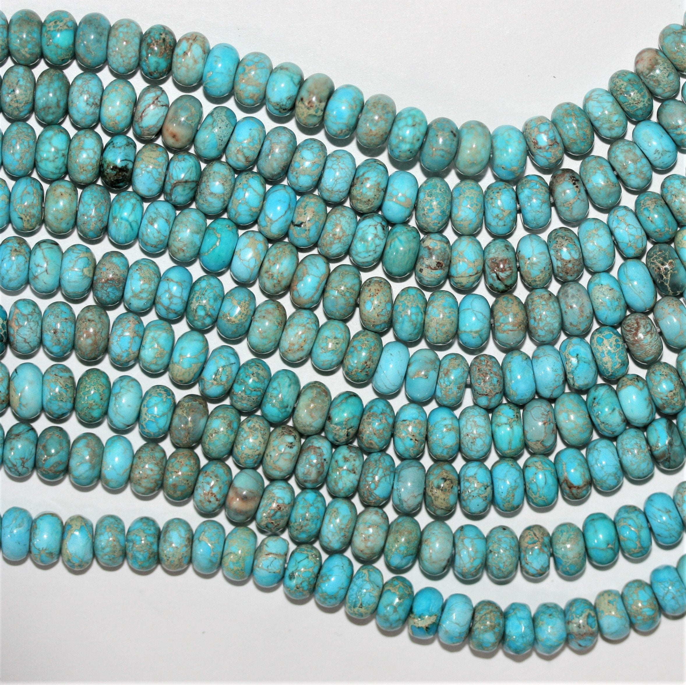 Cuentas redondas lisas de turquesa St. de 16" de 8 x 5 mm - Hilo de 40 cm.