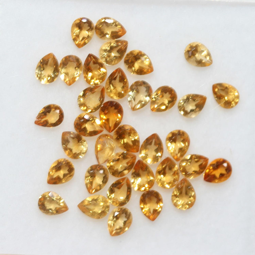 Lot de citrine facettée en forme de goutte 4x3mm. (5CT).