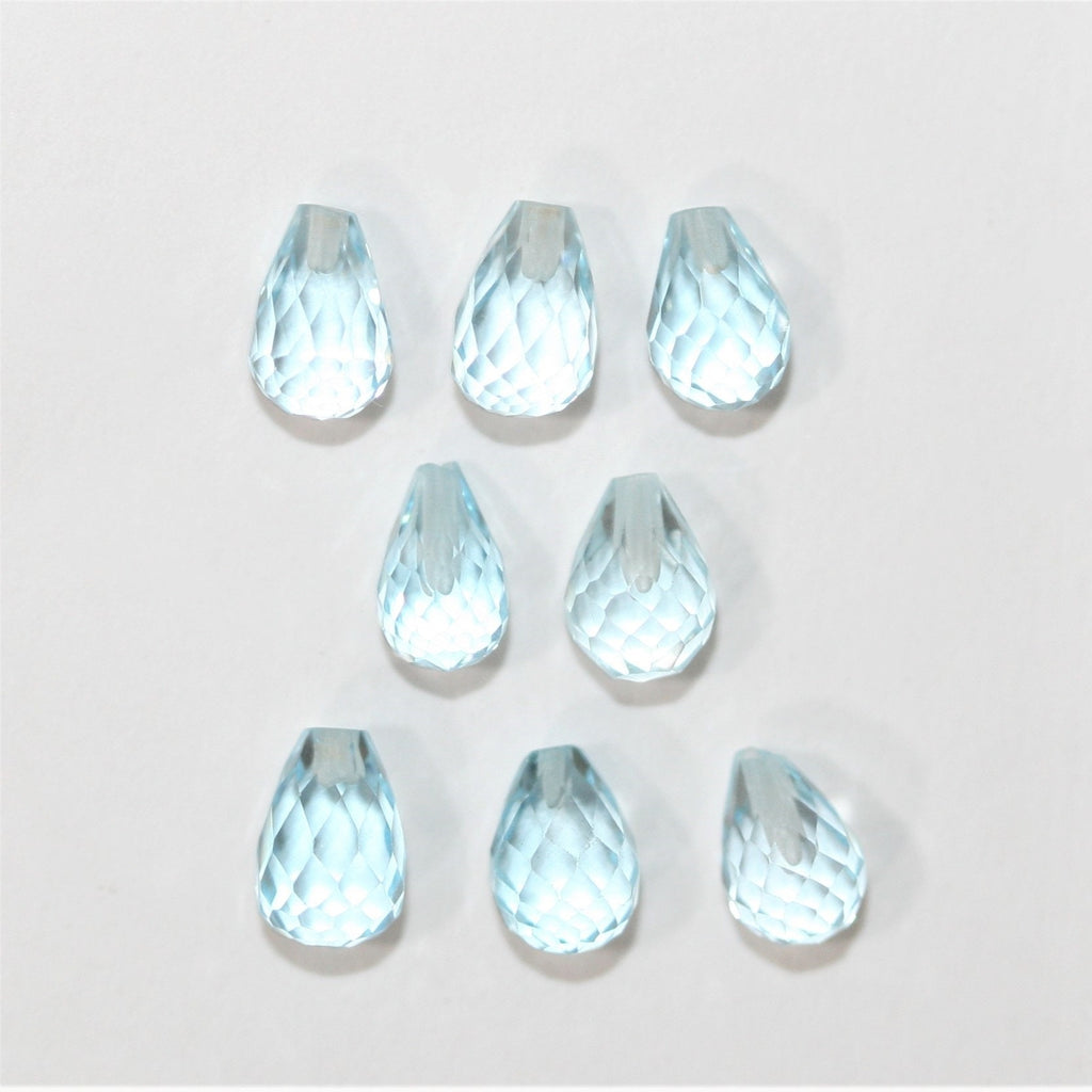 Lot de 8 topazes Sky demi-percées à facettes en forme de goutte, 6 x 4 mm.