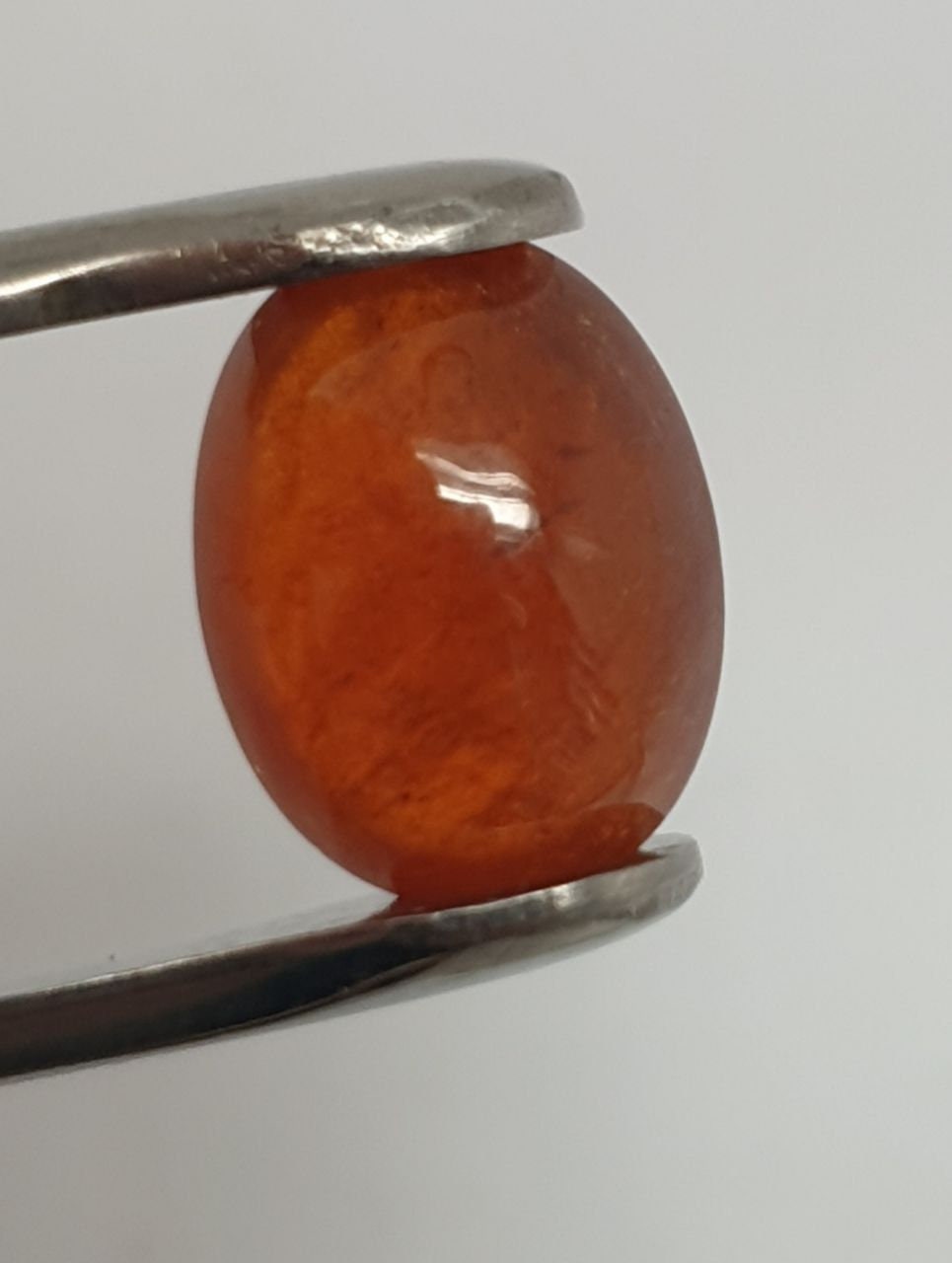 Spessartine Garnet Oval Cabochon 14x10.6mm. (10.7ct.).