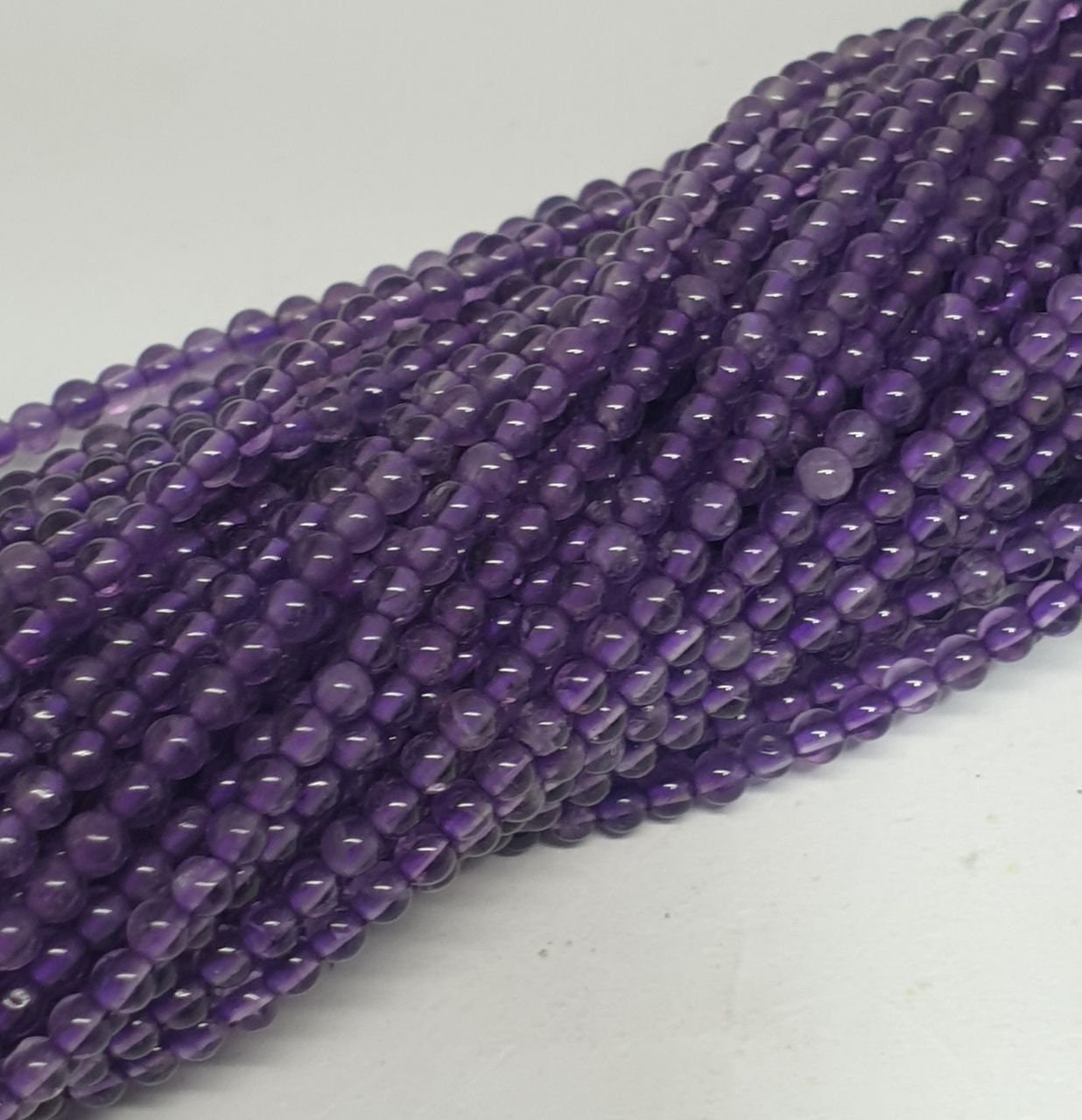 Perles rondes lisses en améthyste AAA 15" St 2 mm.-Rig 39 cm.