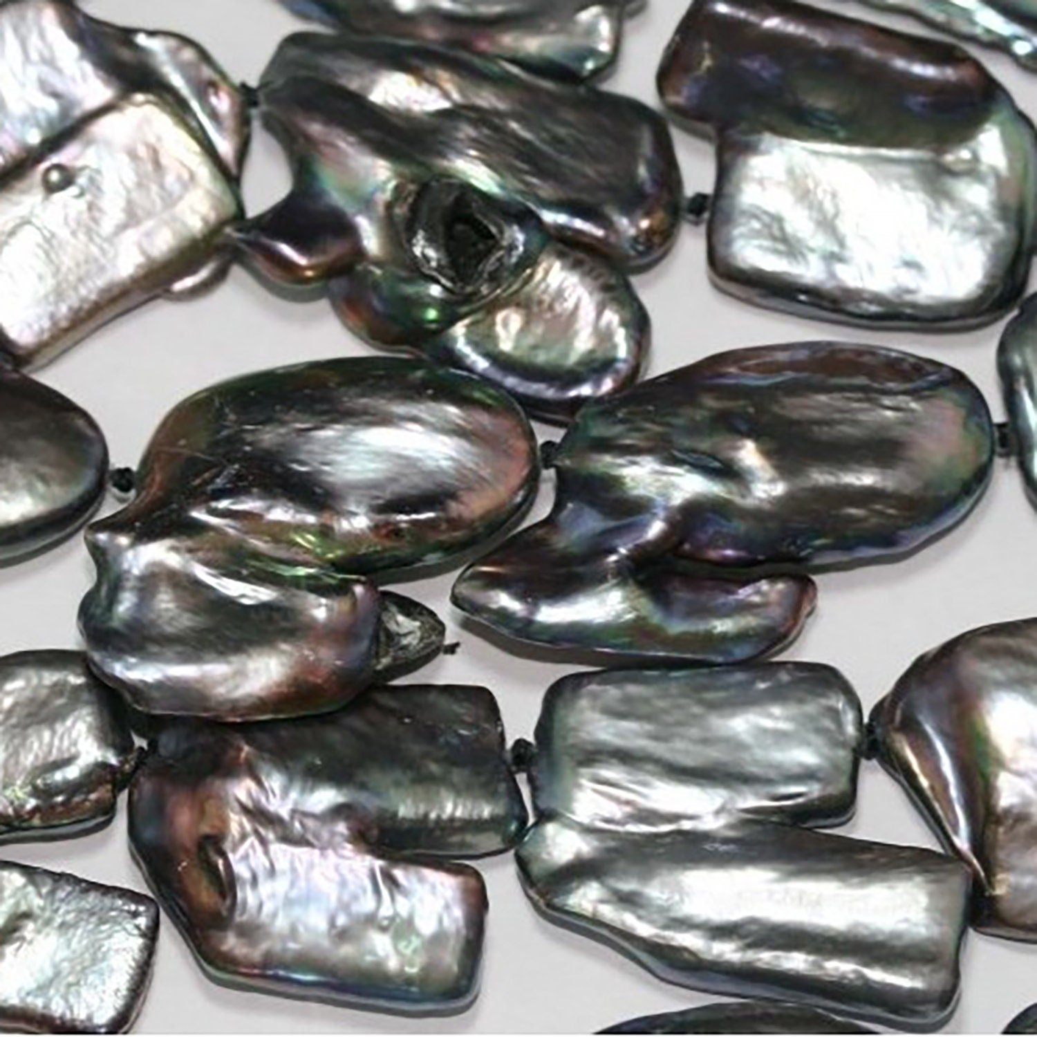 Perle Keshi grise d'eau douce, 16 pouces (environ 40 cm), 24 x 15 mm. Longueur du brin : 40 cm.