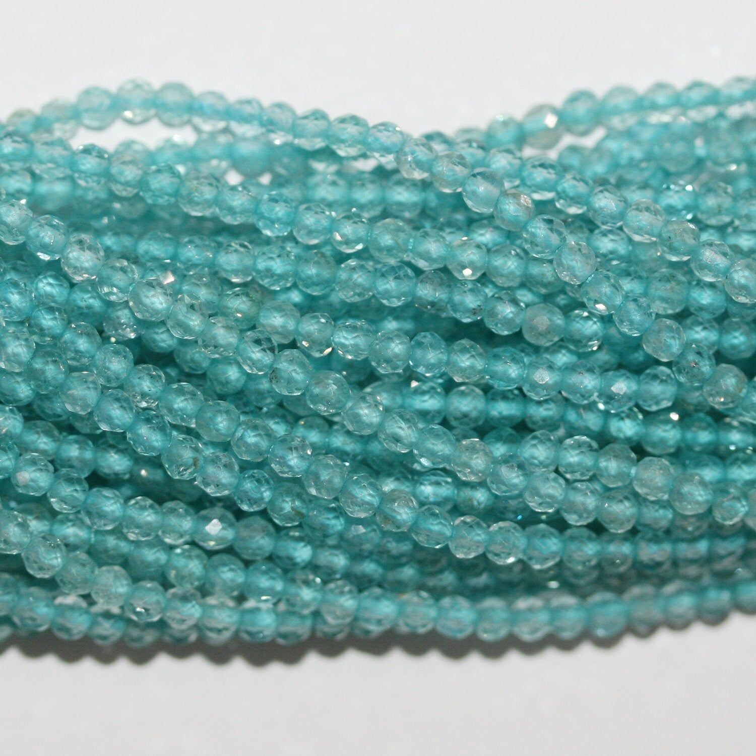 13" St  Apatite Faceted Round Beads 2.5mm.-Strand 33cm.