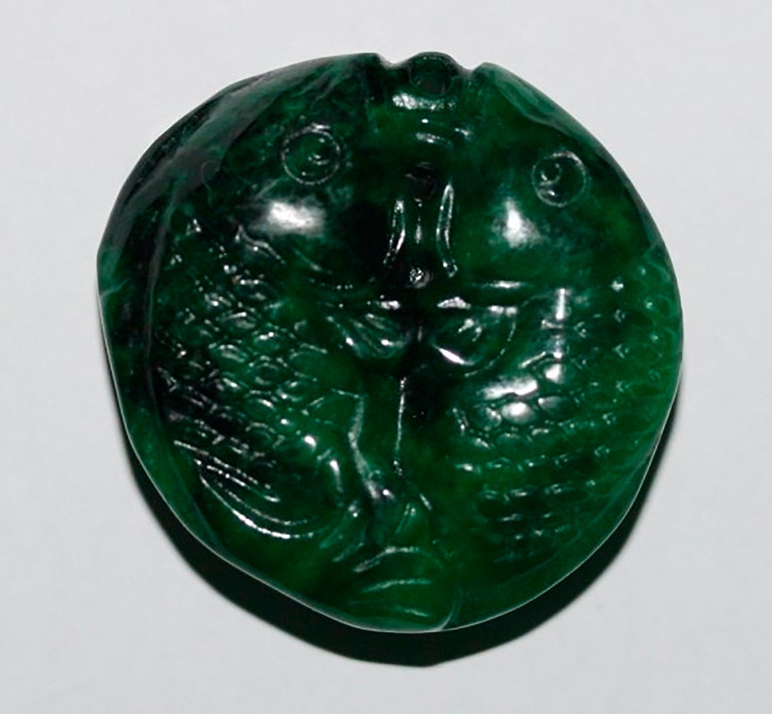 Pendentif en jade vert 35 mm.