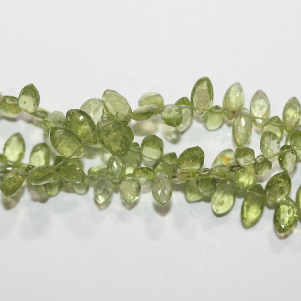 Perles de péridot facettées en forme de marquise, 8 x 5 mm, environ 20 cm de long.