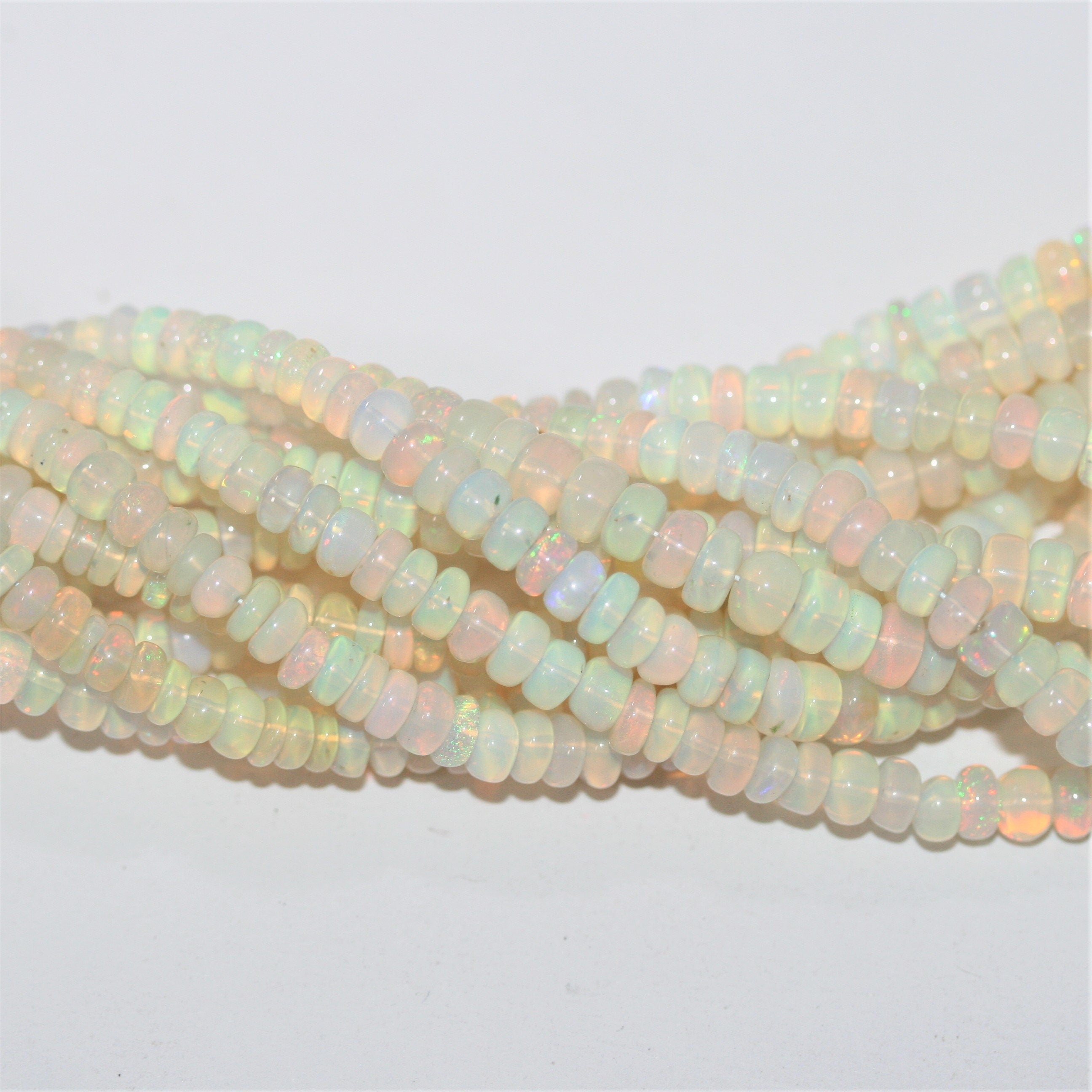 Cuentas redondas lisas graduadas de ópalo etíope de 16", 4 x 2 - 5,5 x 3 mm, tira de 40 cm.