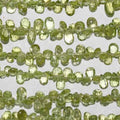 Perles en péridot facettées, percées sur le côté, 8 pouces (6 x 4 mm) - Fil de 20 cm