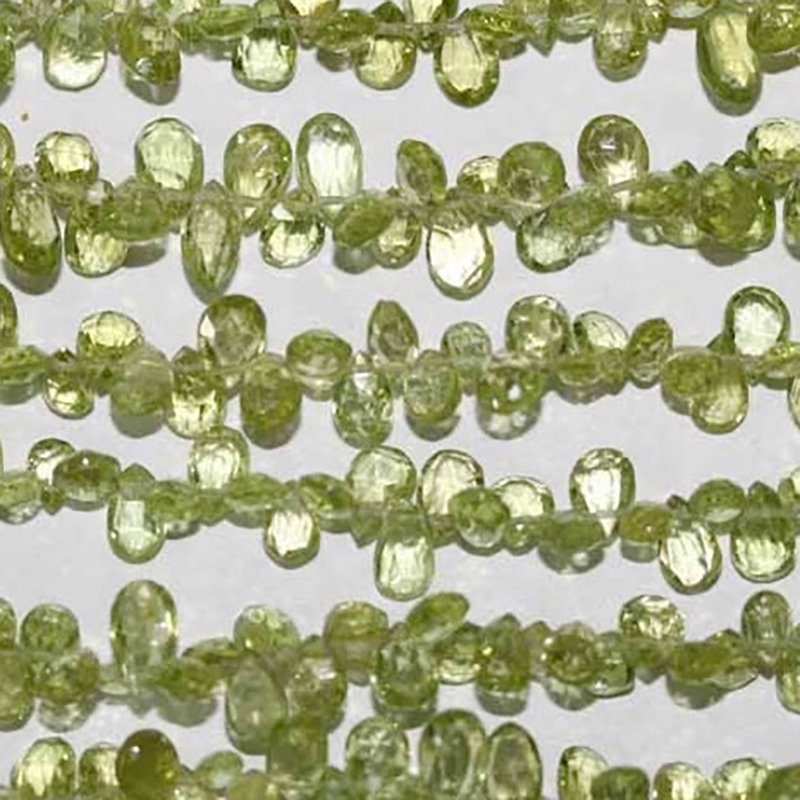 Perles en péridot facettées, percées sur le côté, 8 pouces (6 x 4 mm) - Fil de 20 cm