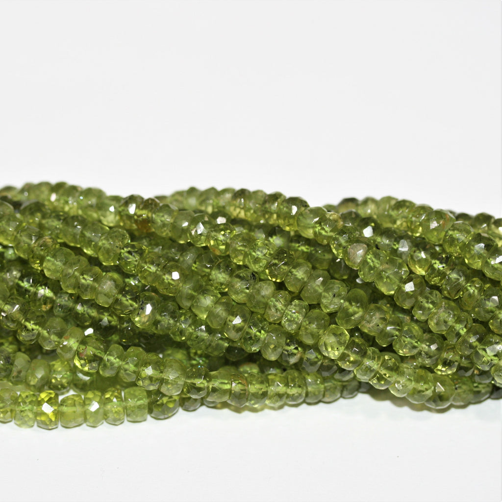 13" St Peridot Faceted Rondelle Beads 6x3.5mm.-Strand 33cm.