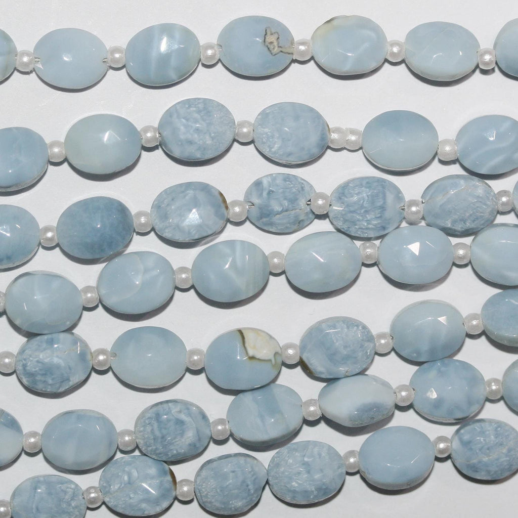 Cuentas ovaladas facetadas de ópalo azul de 16" de 9 x 7 mm - Hilo de 20 cm.
