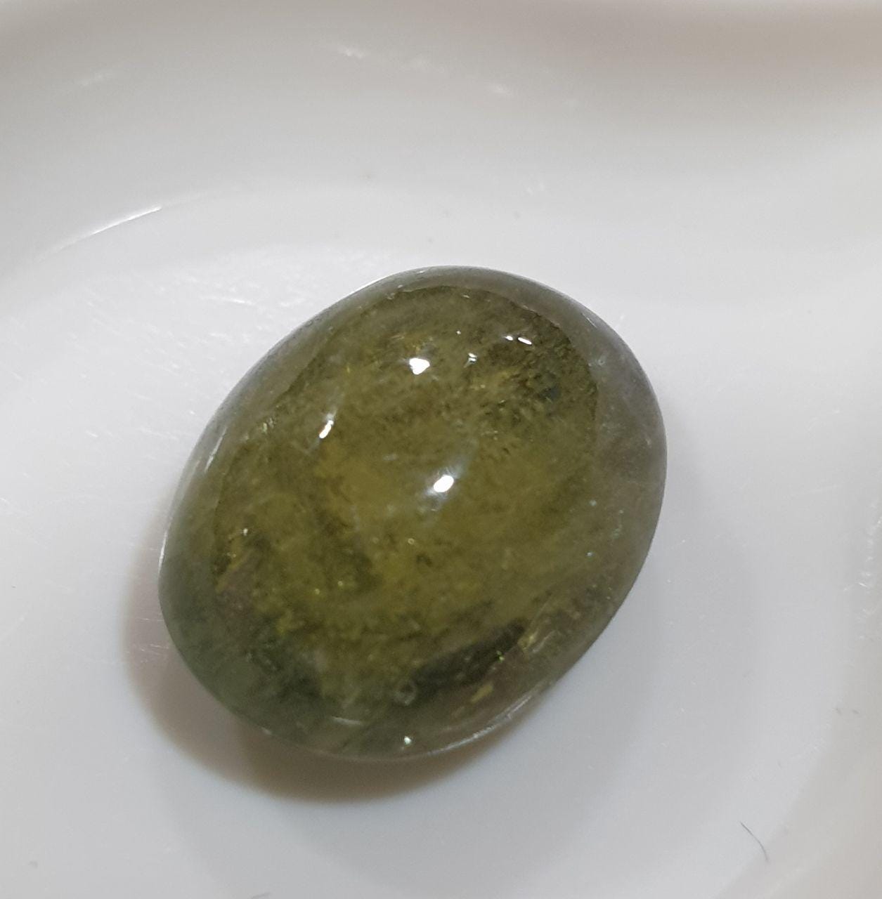 Natural Green  Sapphire Oval Cabochon. 15.8x12.2mm. (14ct.)