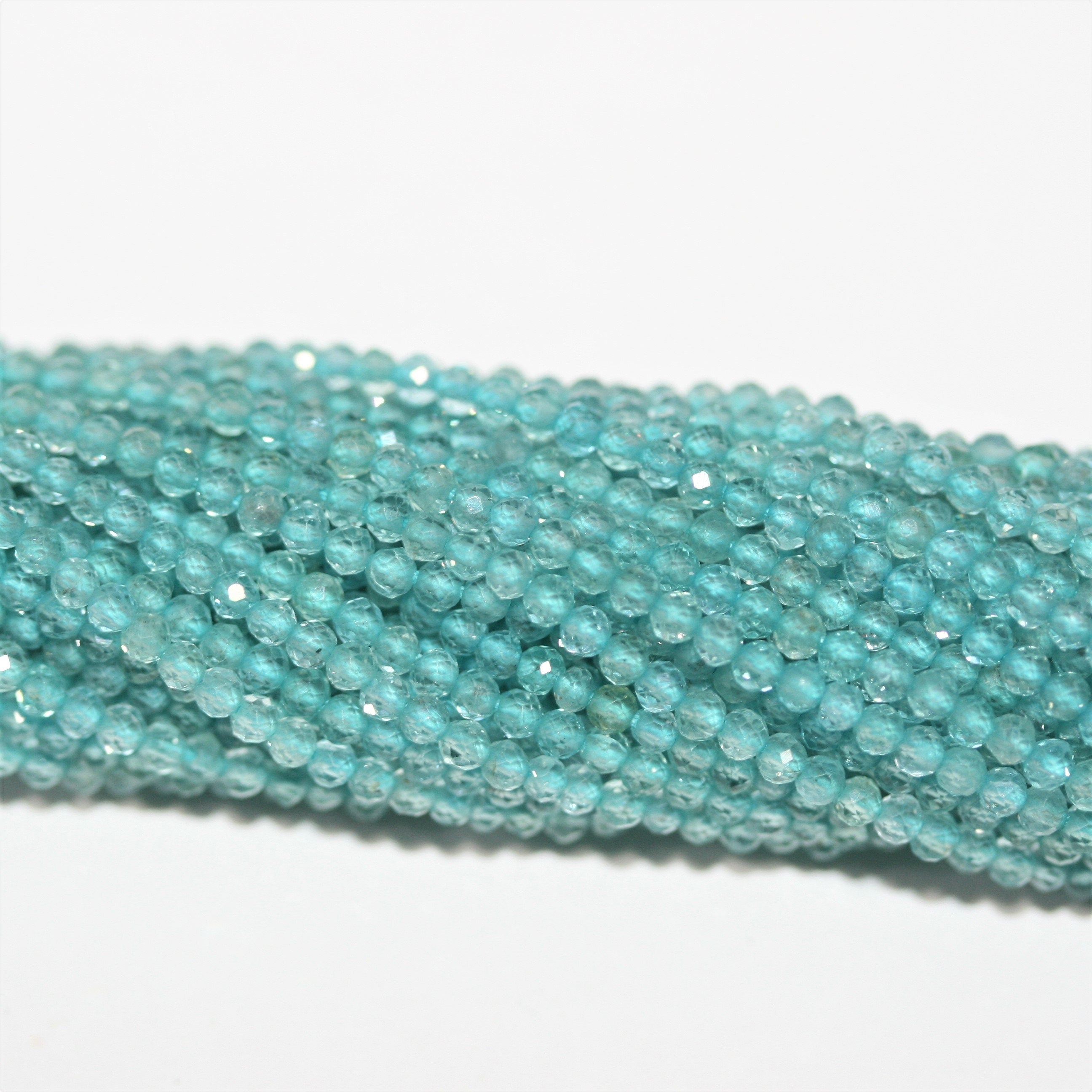 12" St Blue Apatite Faceted Round Beads 2mm.- Strand 32cm.