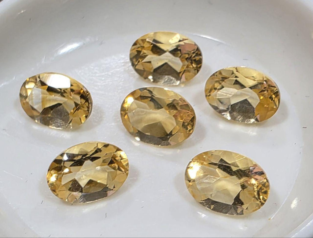 Lot de 6 citrines ovales à facettes de 7 x 5 mm. Pierres précieuses en vrac, prix de gros.