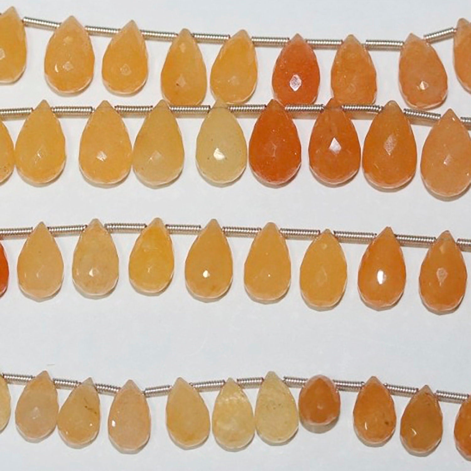 Cuentas de calcita facetadas de 18 cm (7"), 12 x 7 mm (aprox. - Hilo de 20 cm)