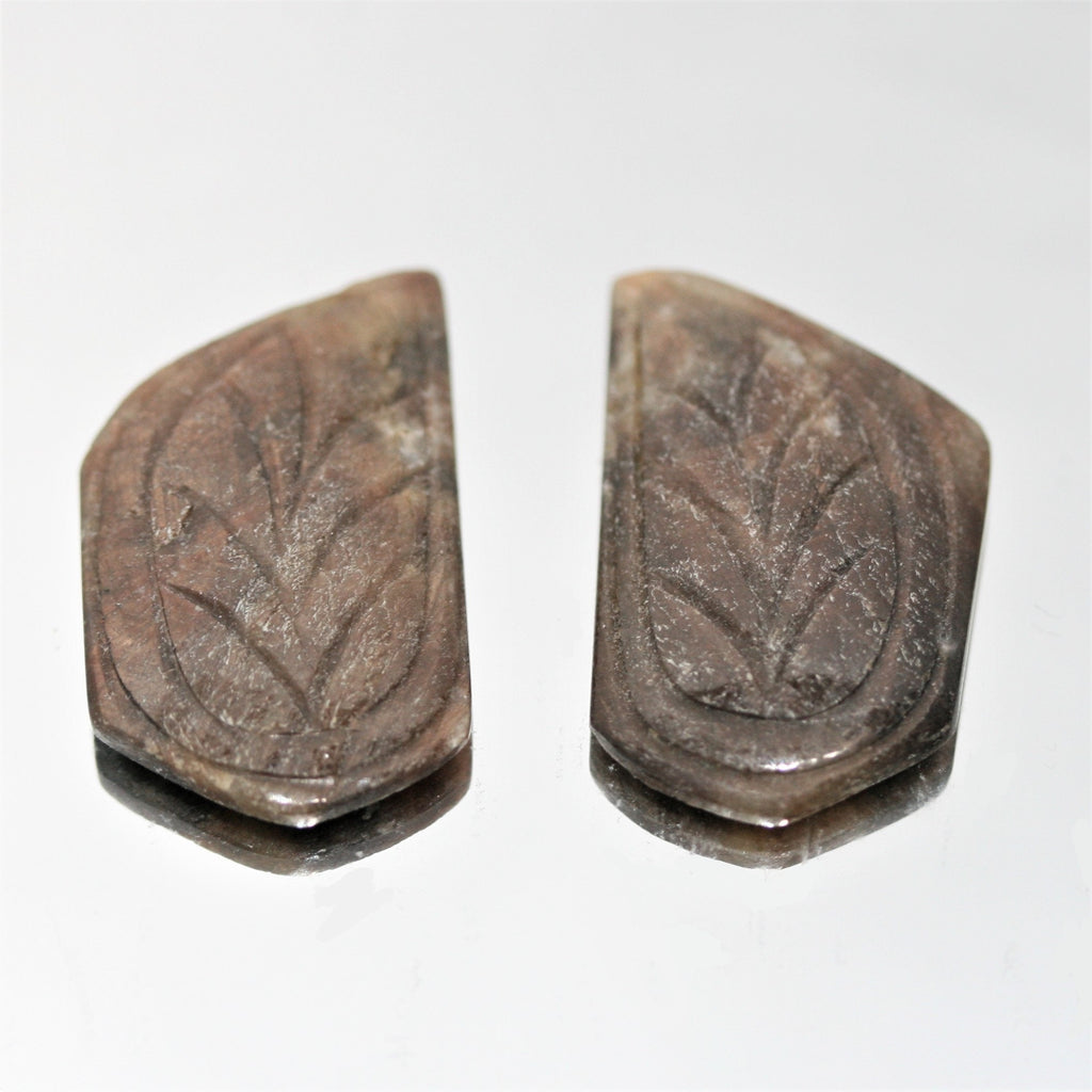 Sapphire Carved Oval Cabochon 28x17mm. (42.25 ct.).- 1 Pair