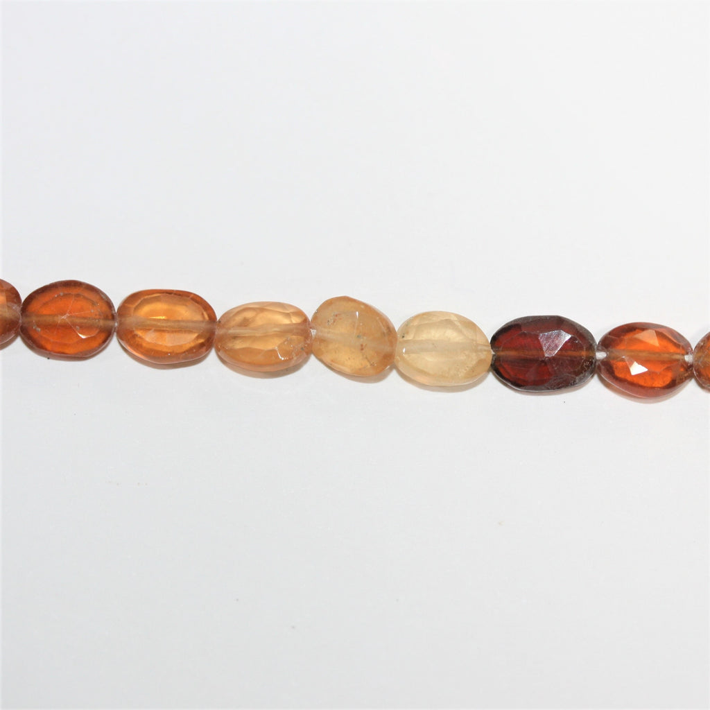 12" St Hesonite Garnet Faceted Oval Beads 8x6mm. Approx.- Strand 32cm.
