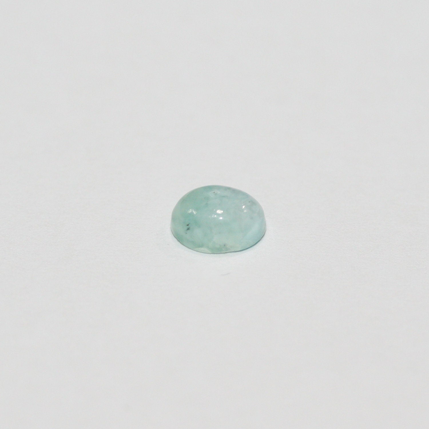 Lote de 15 cabujones ovalados de Larimar de 7 x 5 mm. (15 uds.).