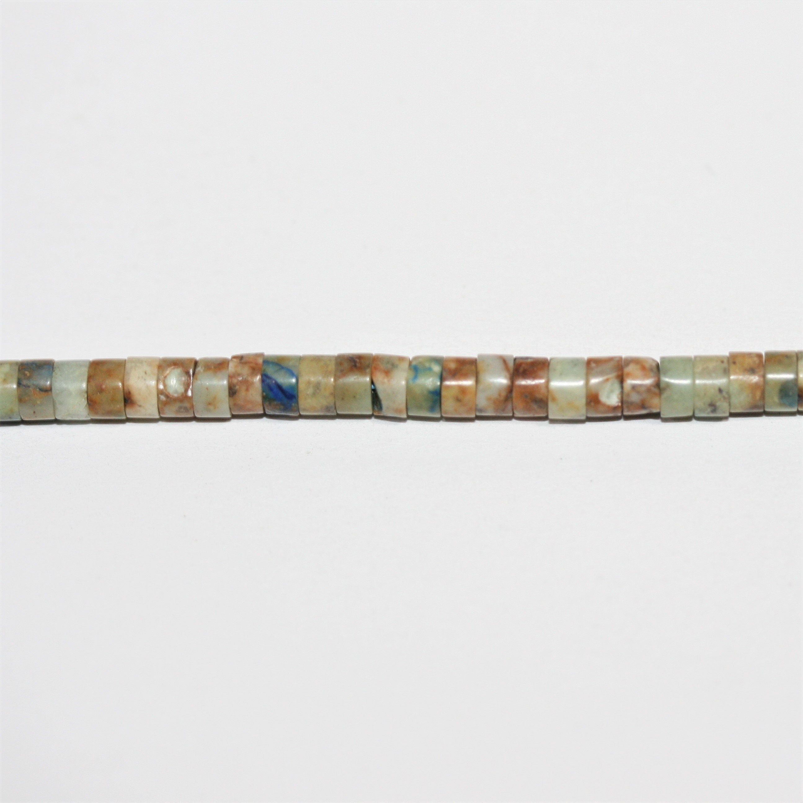 Perles disques lisses en chrysocolle St 15" 4x2mm.- Brin 39cm.