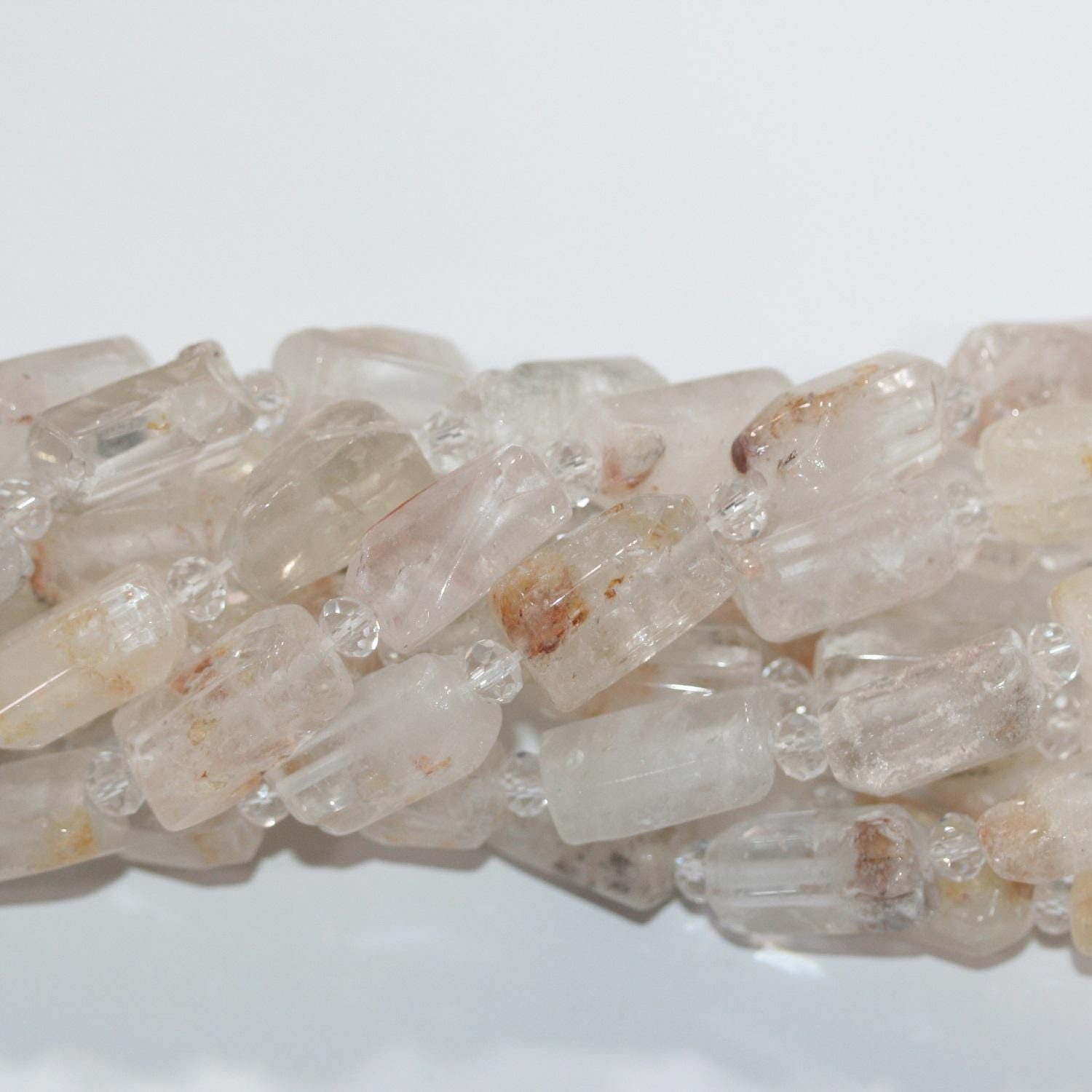 Cuentas tubulares facetadas de cuarzo cristal de roca de 16" (16 x 12 mm). Tira de 40 cm aprox.
