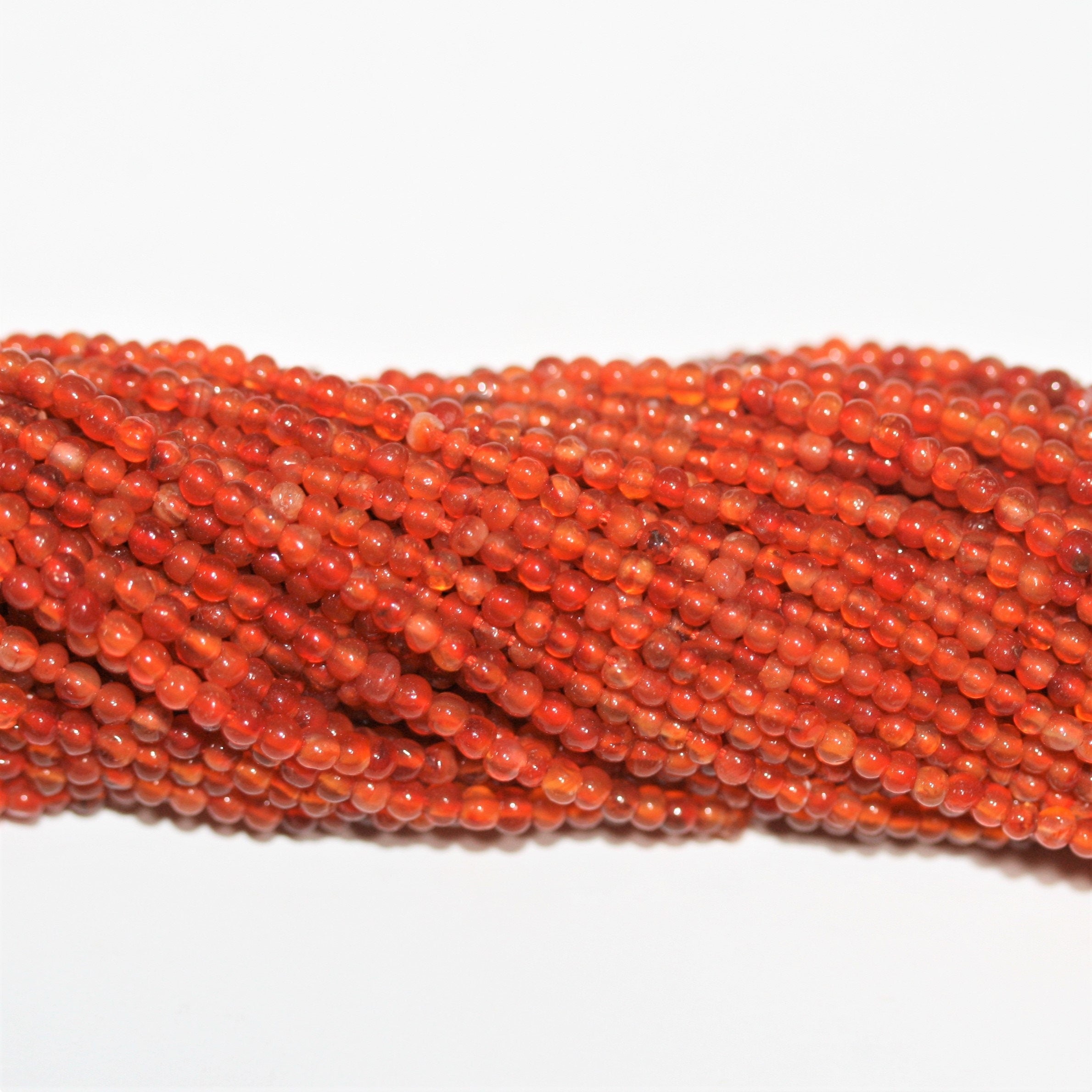 13" St Carnelian Smooth Round Beads 2mm.- Strand 33cm.