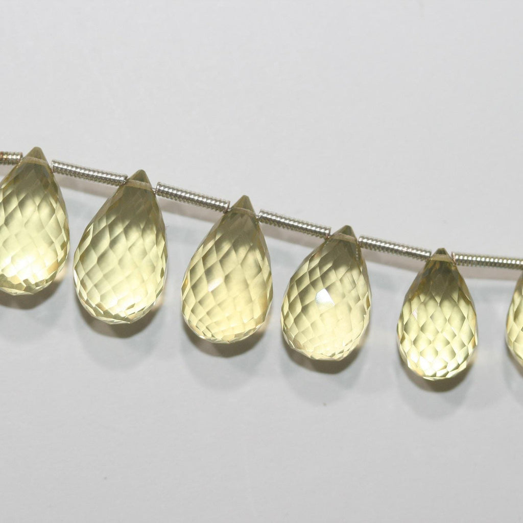 Perles en quartz citron St facettées en forme de goutte, dégradées, 16 x 9 mm - 10 x 5 mm. Longueur approximative : 22 cm. Réf. 14942