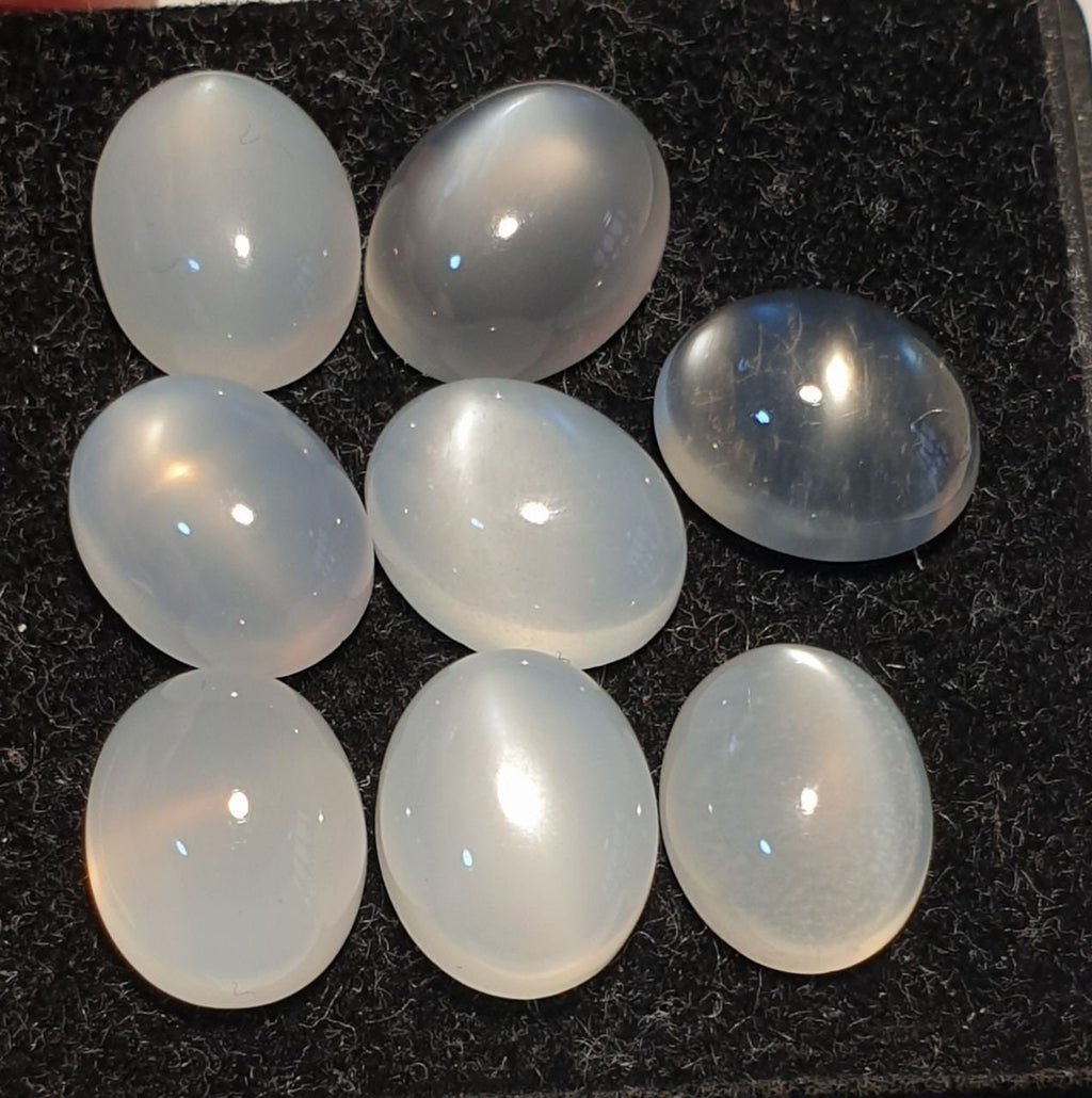 Lote de 8 cabujones ovalados de piedra lunar de ojo de gato blanco de 10 x 8 mm. (8 piezas)