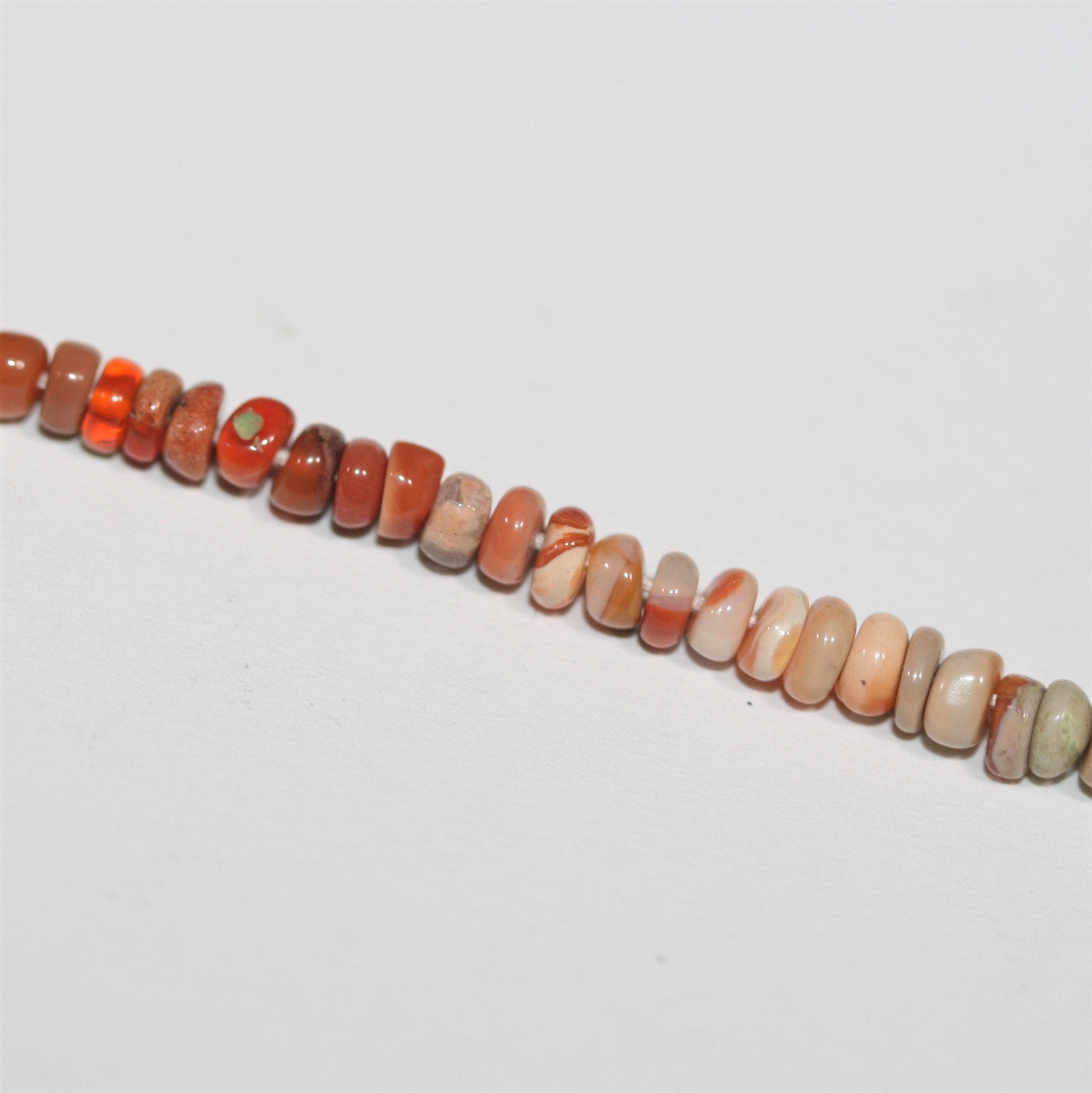 13" St Fire Opal Smooth Rondelle Beads 4x2mm.-Strand 34cm.