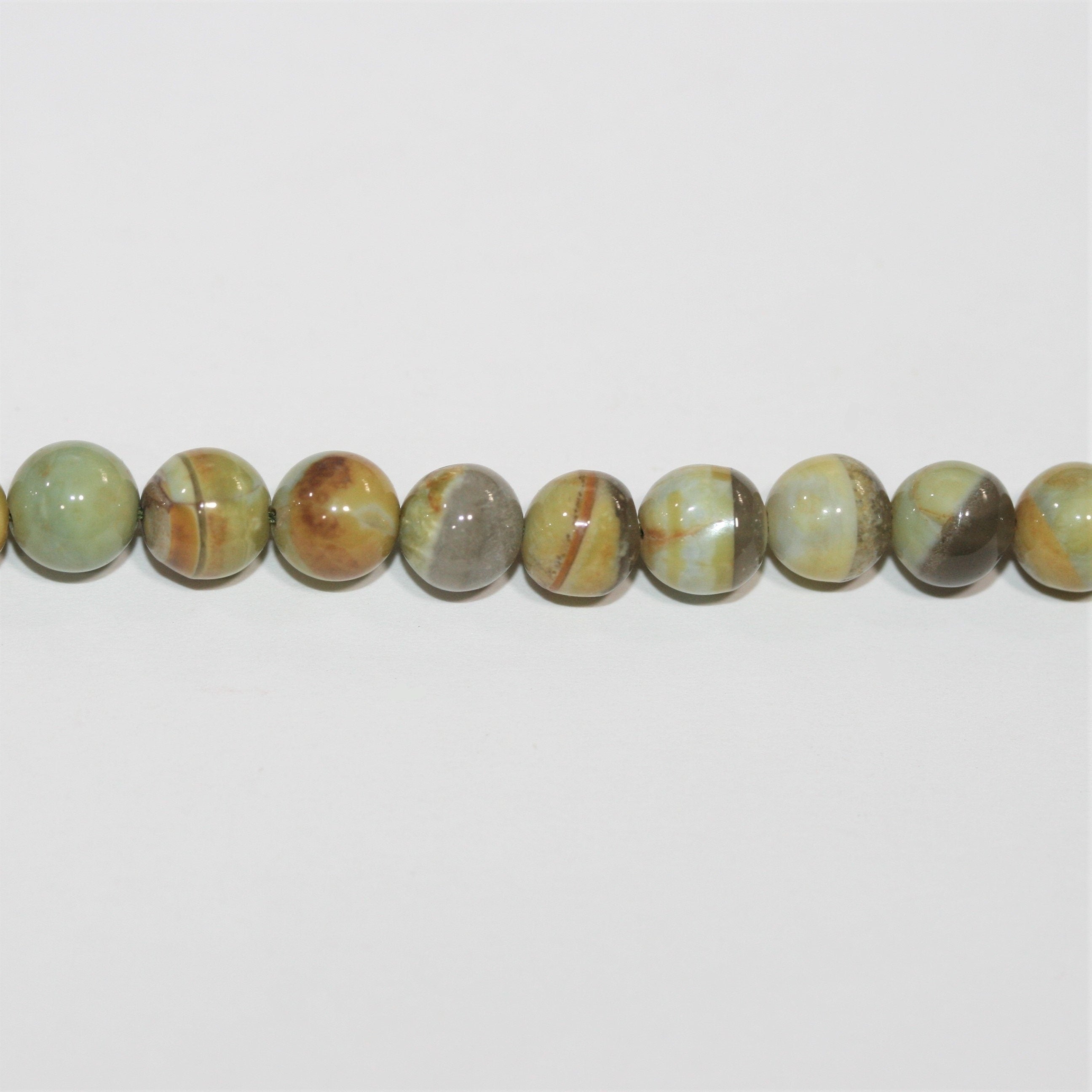 16" St Cuentas Redondas Lisas de Ópalo Azul Verdoso 7 mm - Hilo 40 cm.