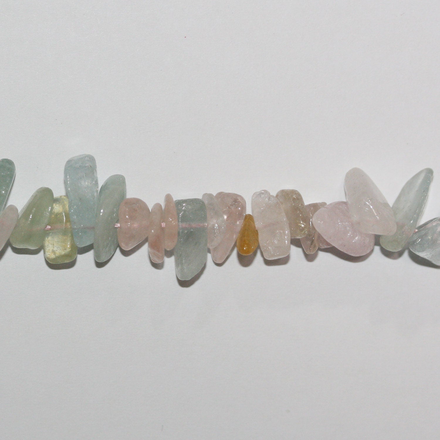 Cuentas lisas de multiberilo de 16" (10 x 8 mm). Aprox. - Hilo de 40 cm.