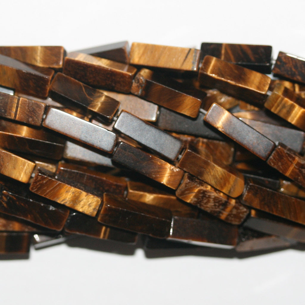 Perles prismatiques lisses œil de tigre St 15" 13x4mm.- Brin 39cm.