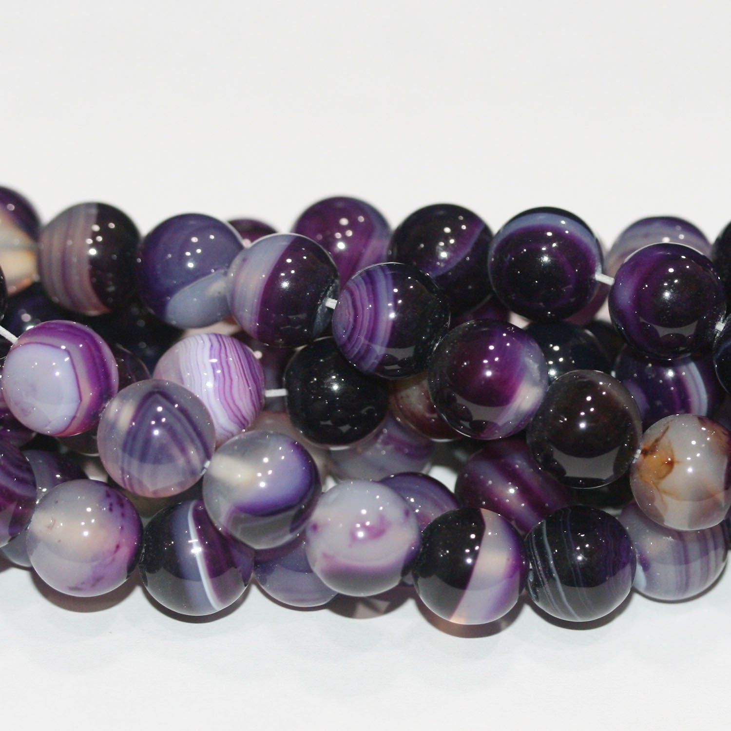 Cuentas redondas lisas de ágata morada de 16" (10-11 mm) - Hilo de 40 cm