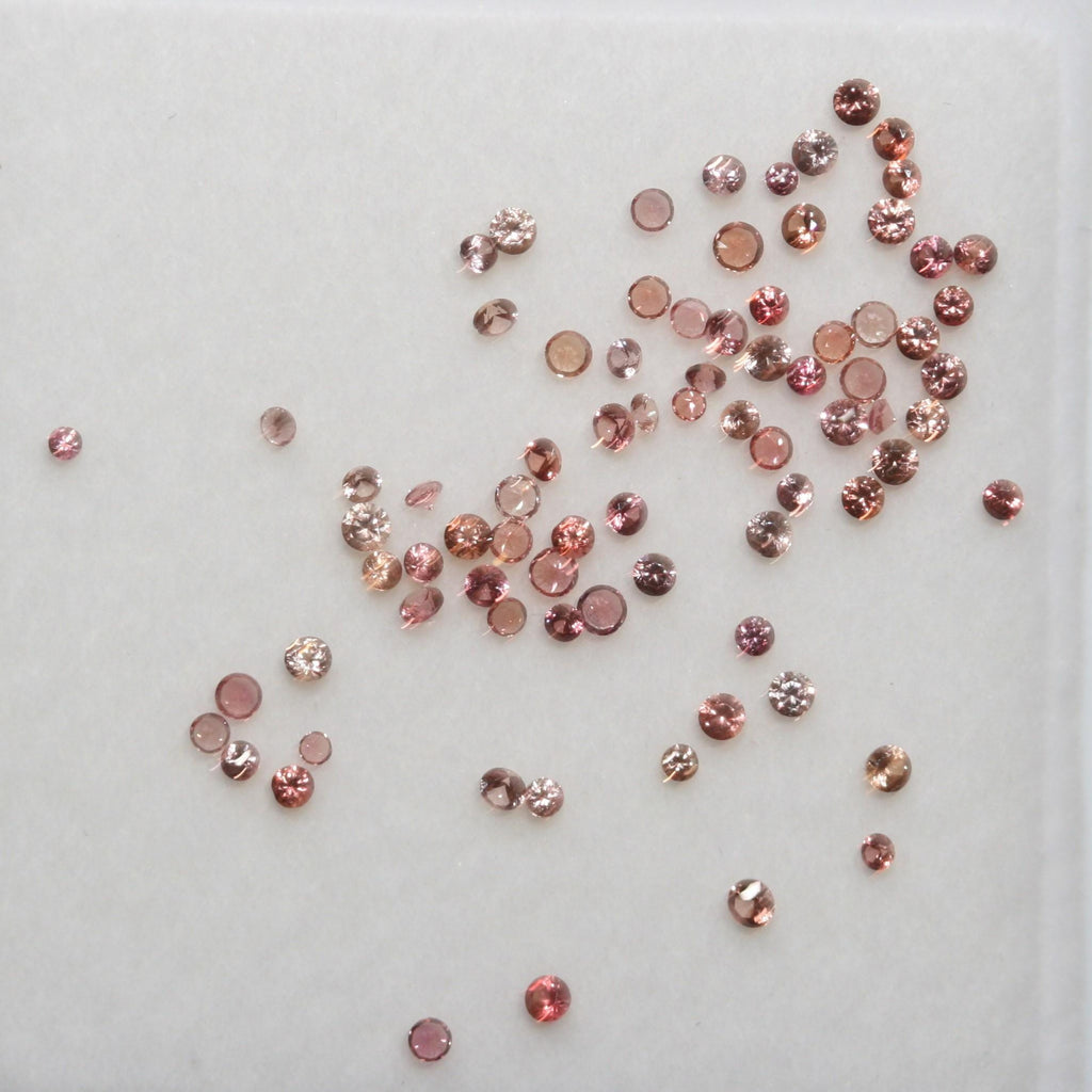 Lote de zafiro naranja redondo facetado de 1 mm. Aprox. 1 quilate.