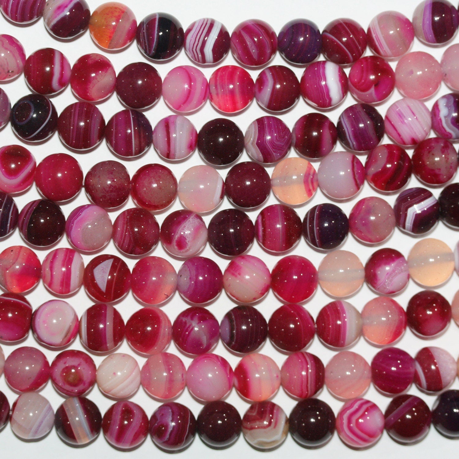 Cuentas redondas lisas de ágata fucsia rayada de 40 cm (16"), 10-11 mm (tira).
