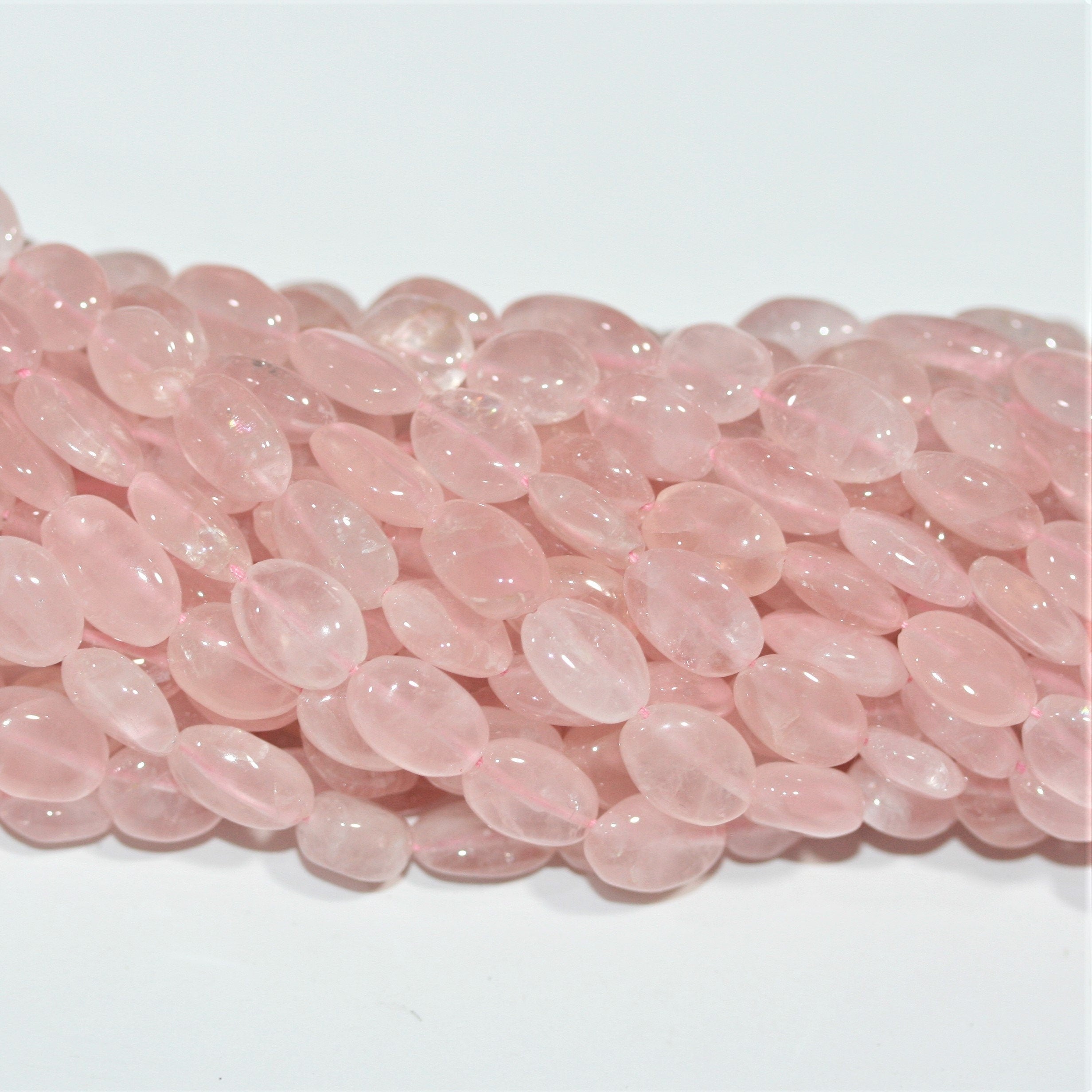 Perles ovales lisses en quartz rose 12x8mm.-Rig 37cm.