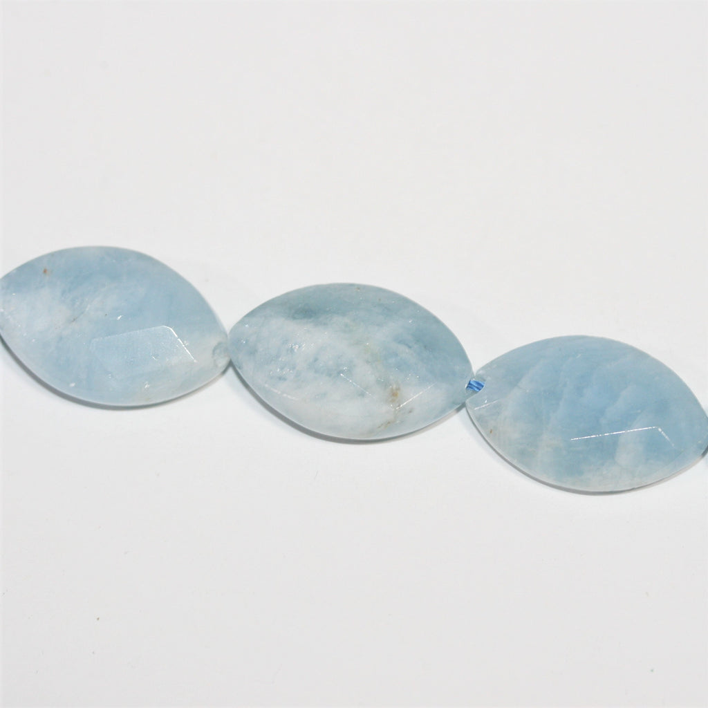 Cuentas Ovaladas Facetadas de Aguamarina 26x16,5mm. aprox. - Tira 35cm.